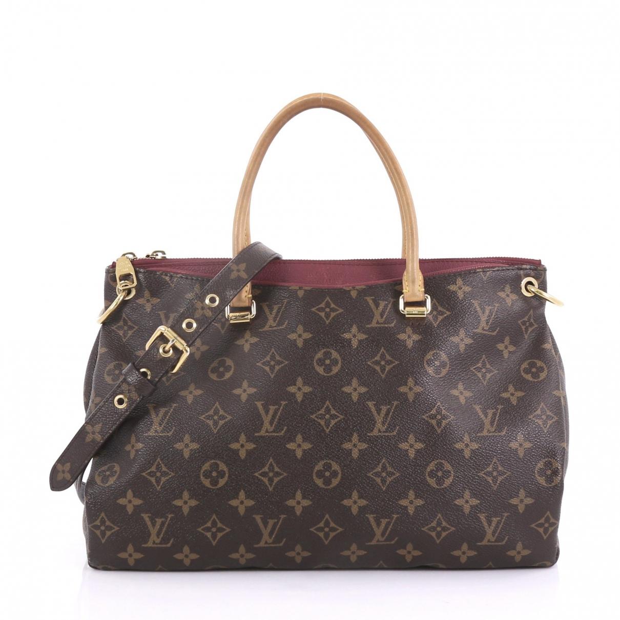 Lyst - Louis Vuitton Pallas Brown Cloth Handbag in Brown