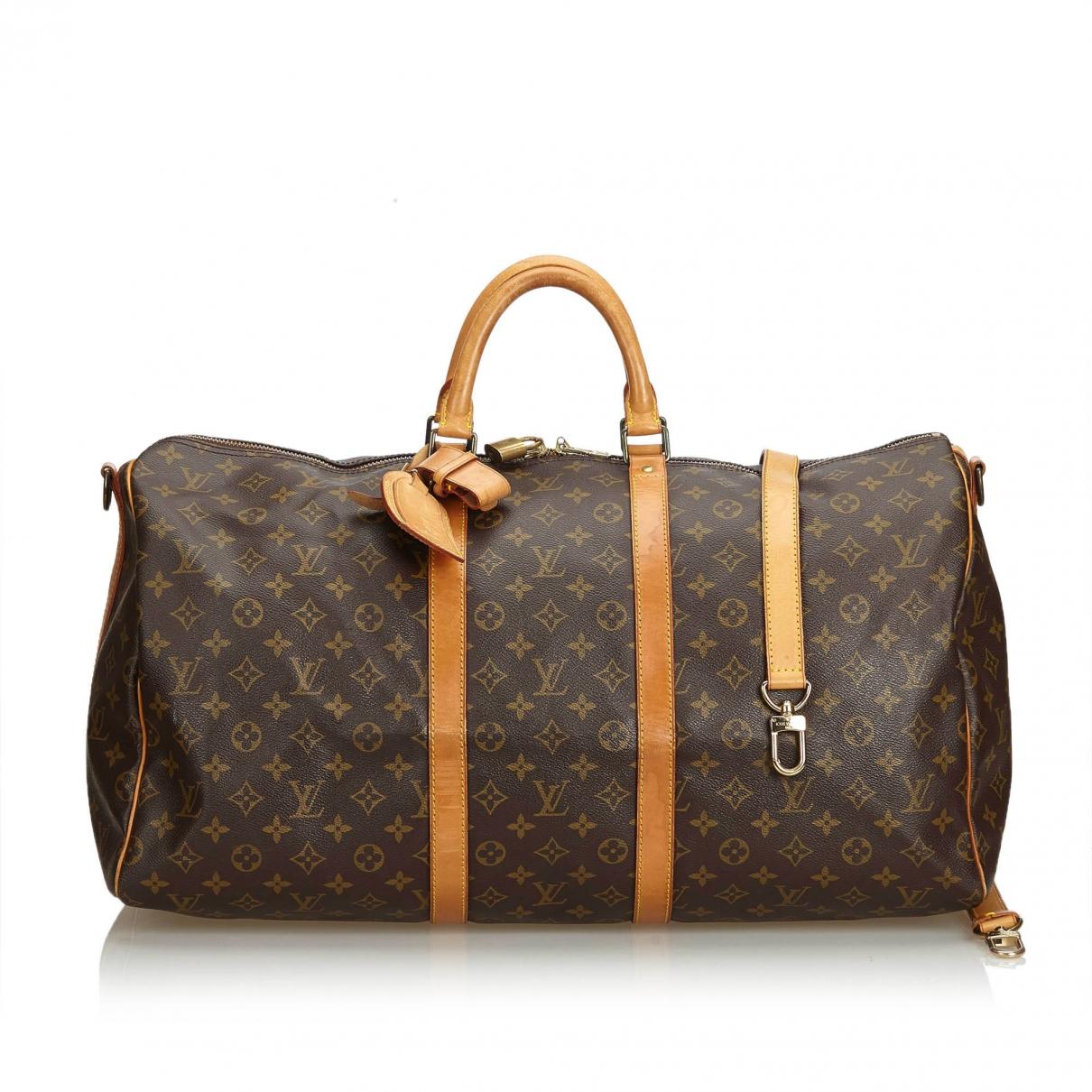 Lyst - Louis Vuitton Vintage Keepall Brown Plastic Travel Bag in Brown