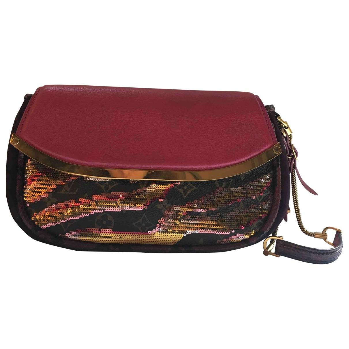 Louis Vuitton Cloth Clutch Bag in Red - Lyst