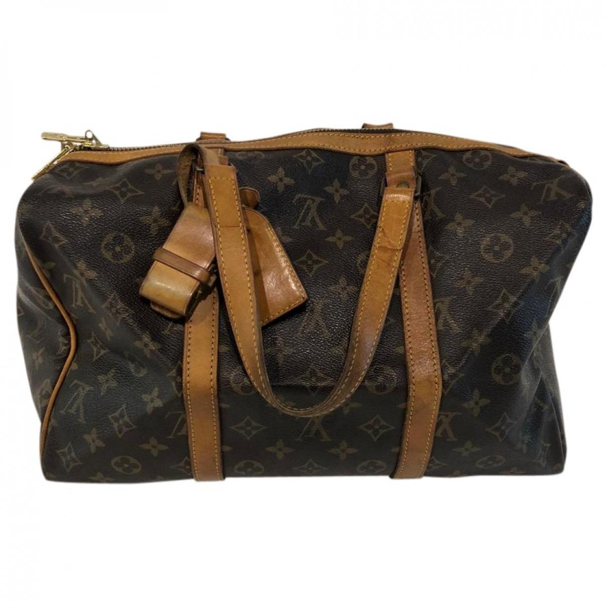 Louis Vuitton Vintage Keepall Brown Synthetic Travel Bag in Brown - Lyst