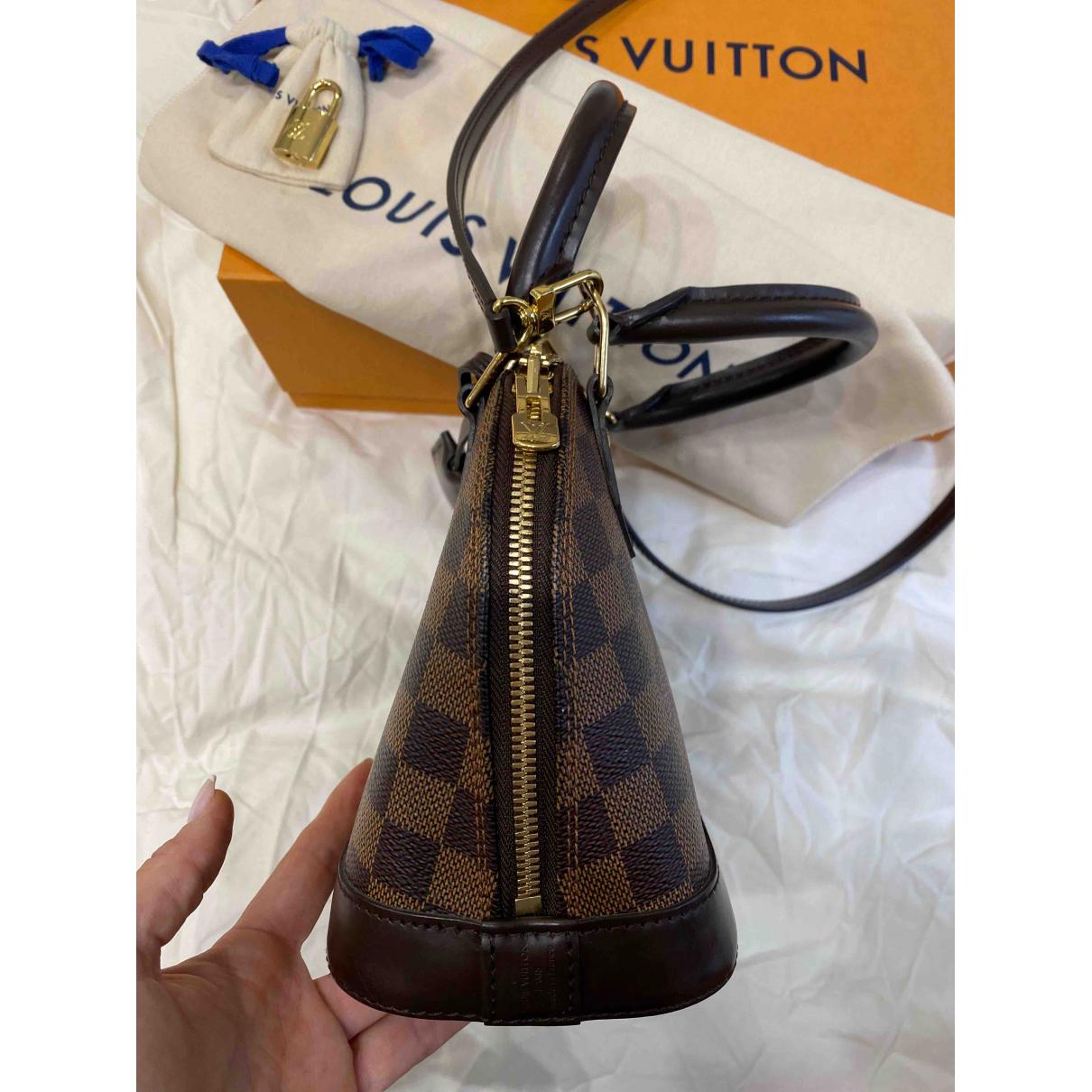 Louis Vuitton Alma Bb Cloth Crossbody Bag - Lyst