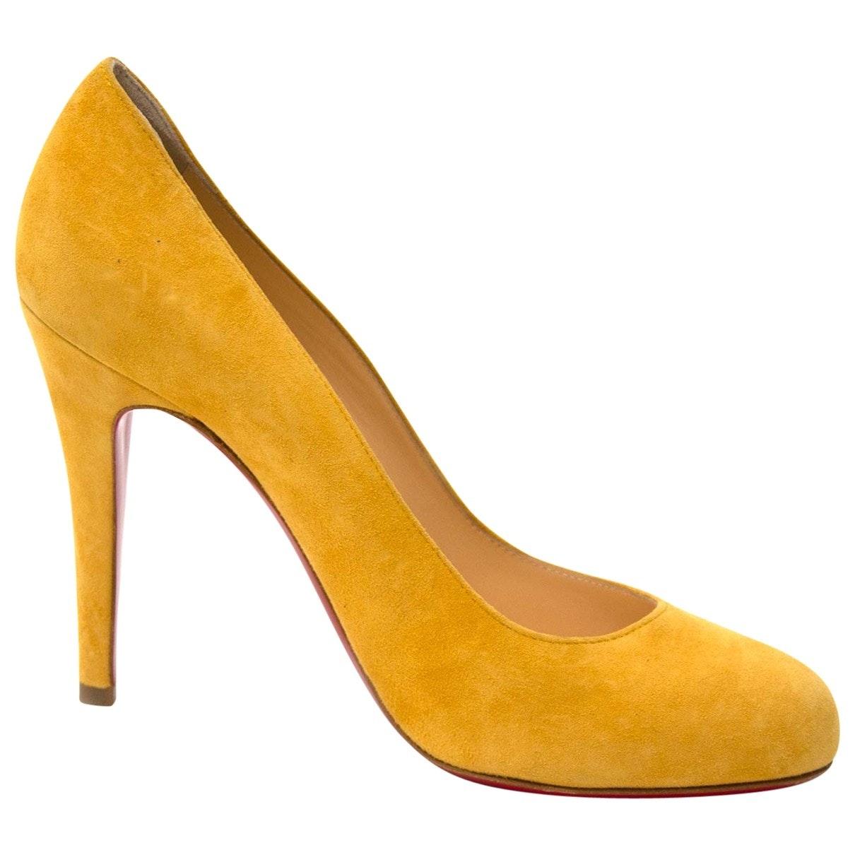 Christian Louboutin Suede Heels in Yellow - Lyst