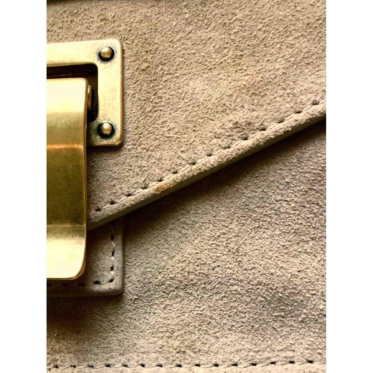 beige suede clutch