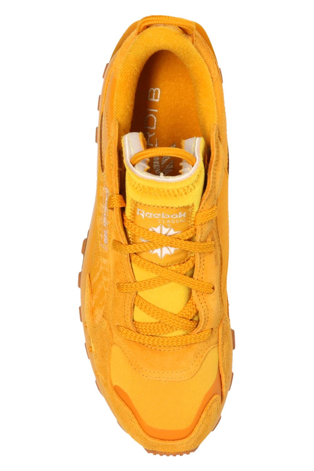 cardi b yellow sneakers