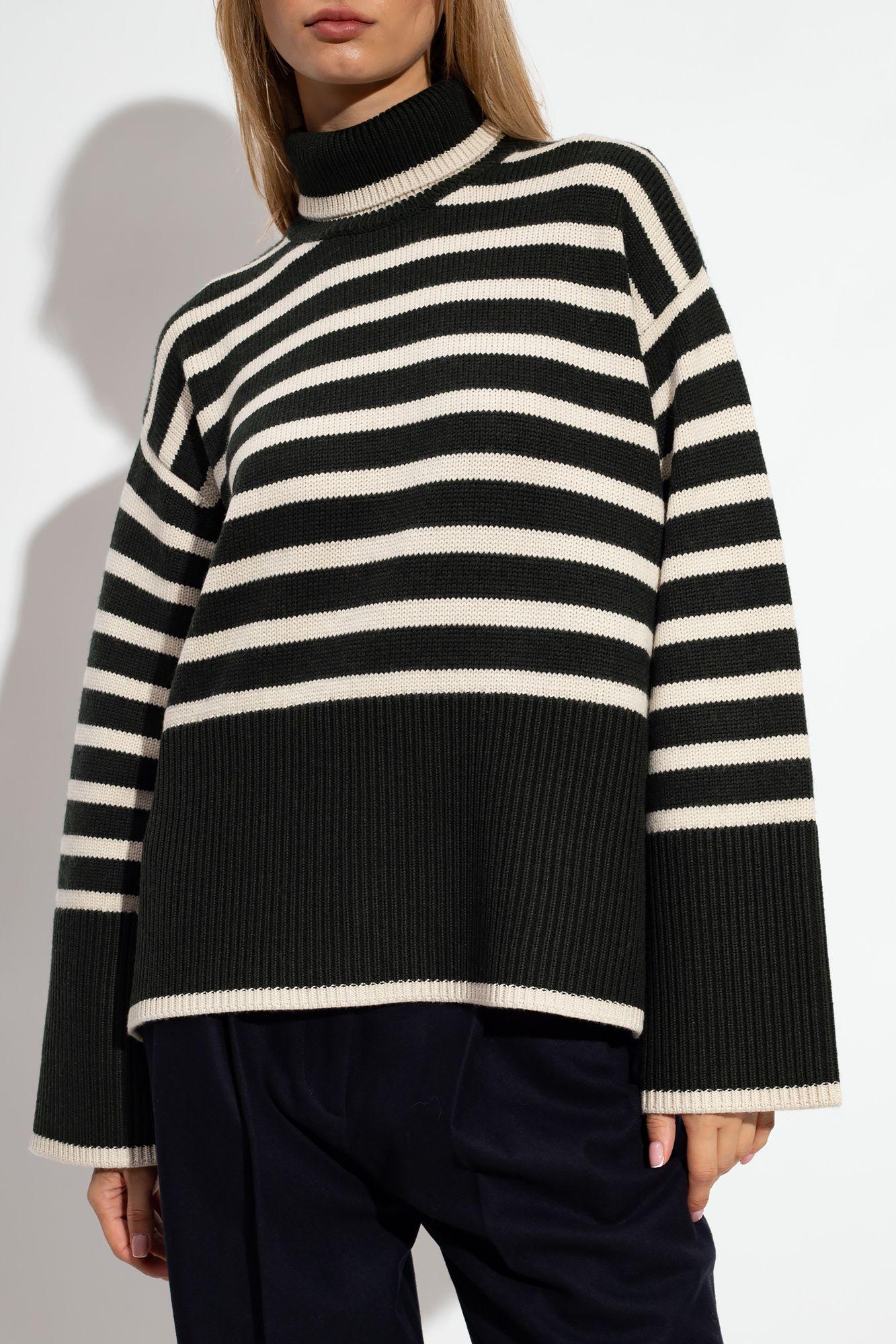 Green striped store turtleneck sweater