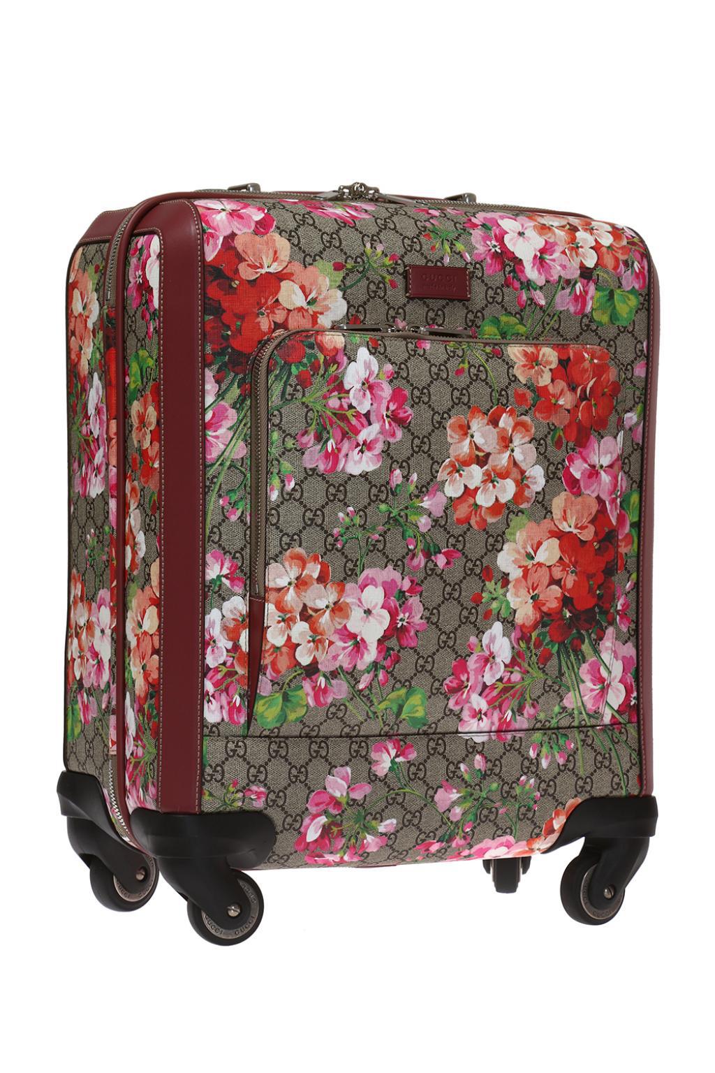 pink gucci suitcase