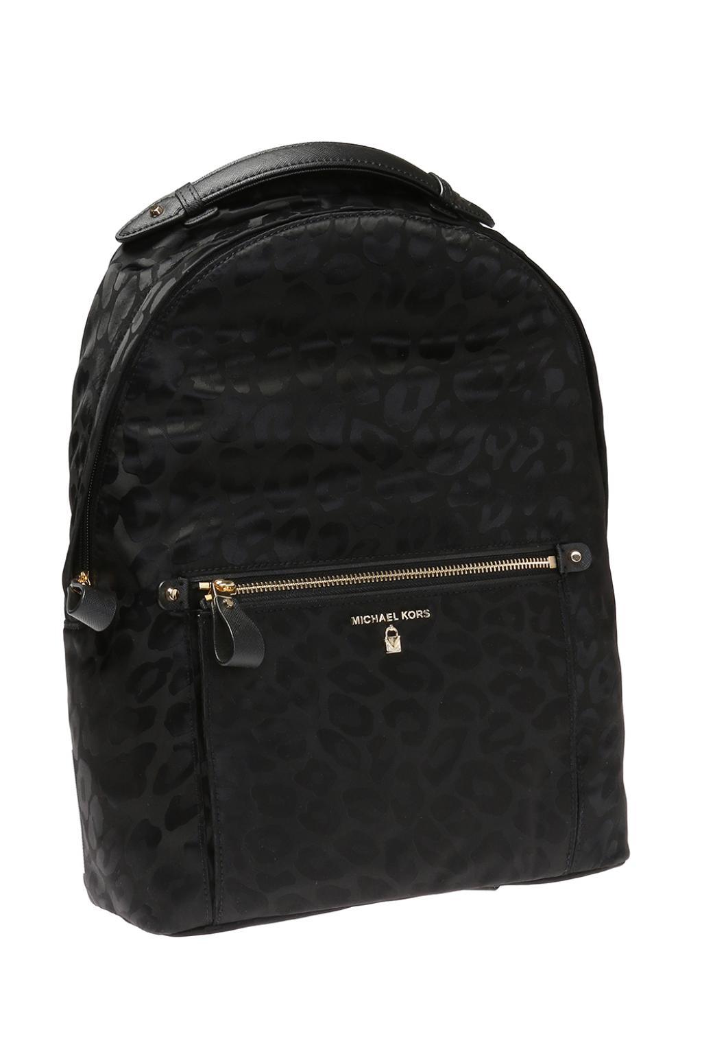 michael kors black cheetah backpack