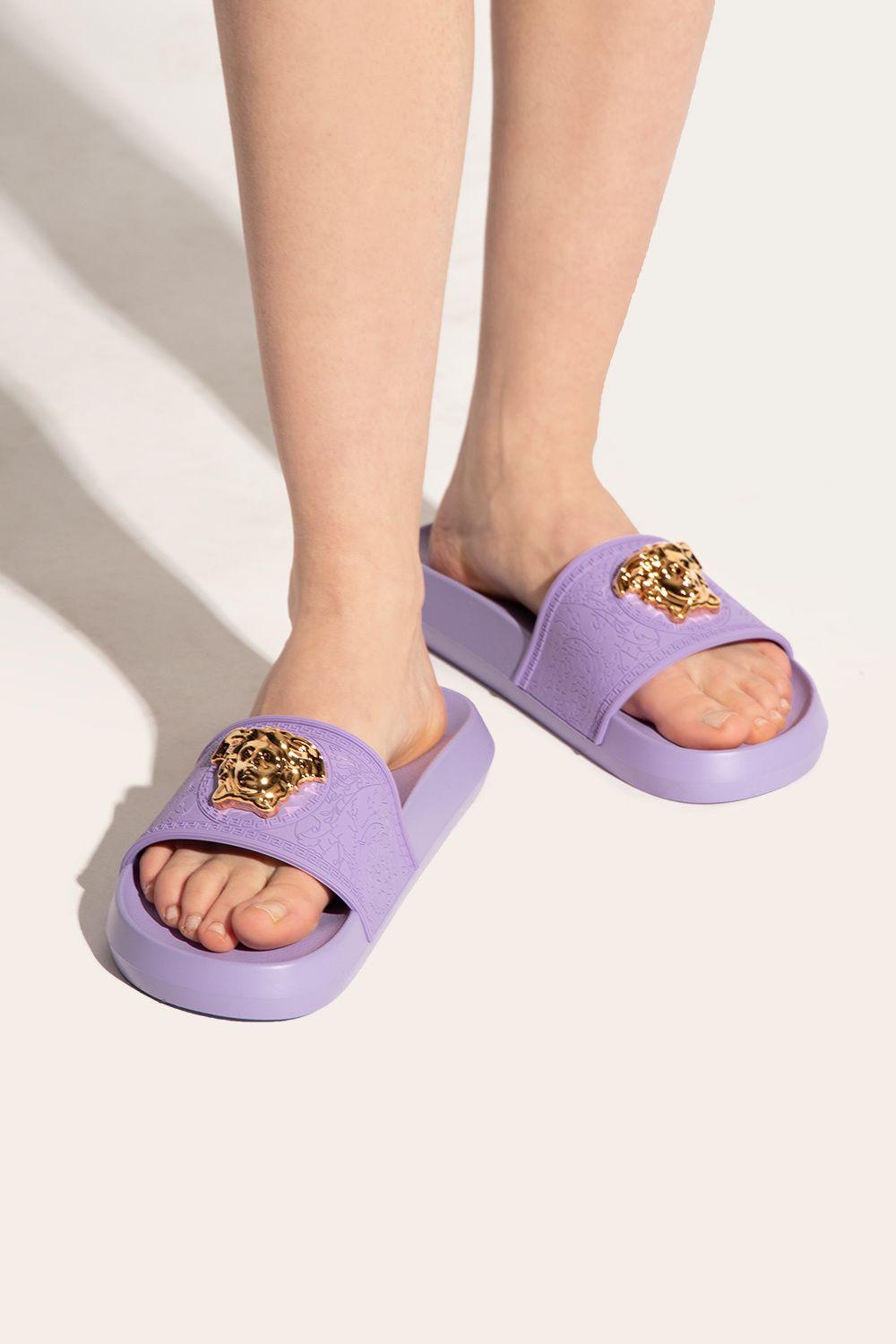 Versace slides store on feet
