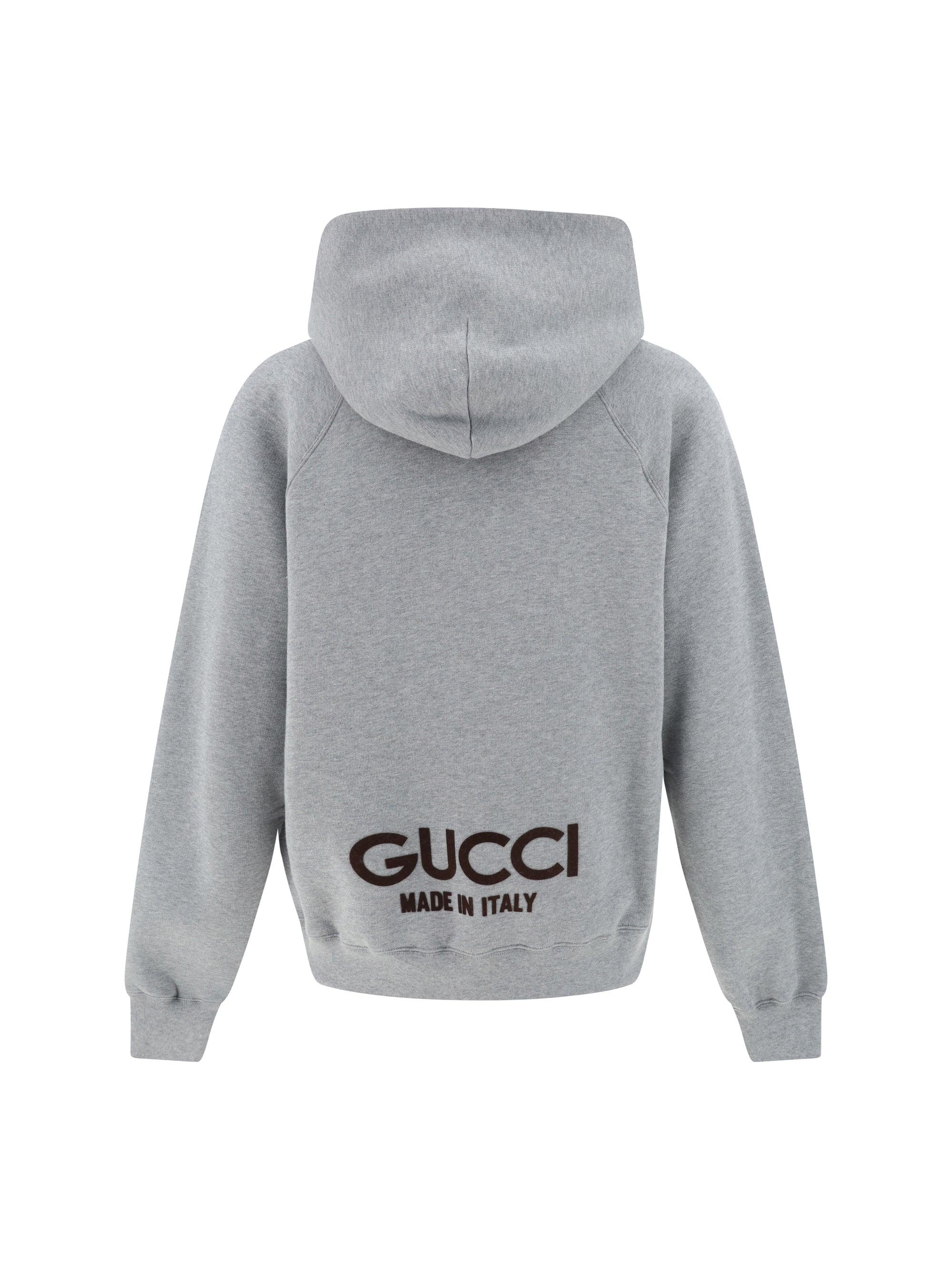 Felpa con sale cappuccio gucci