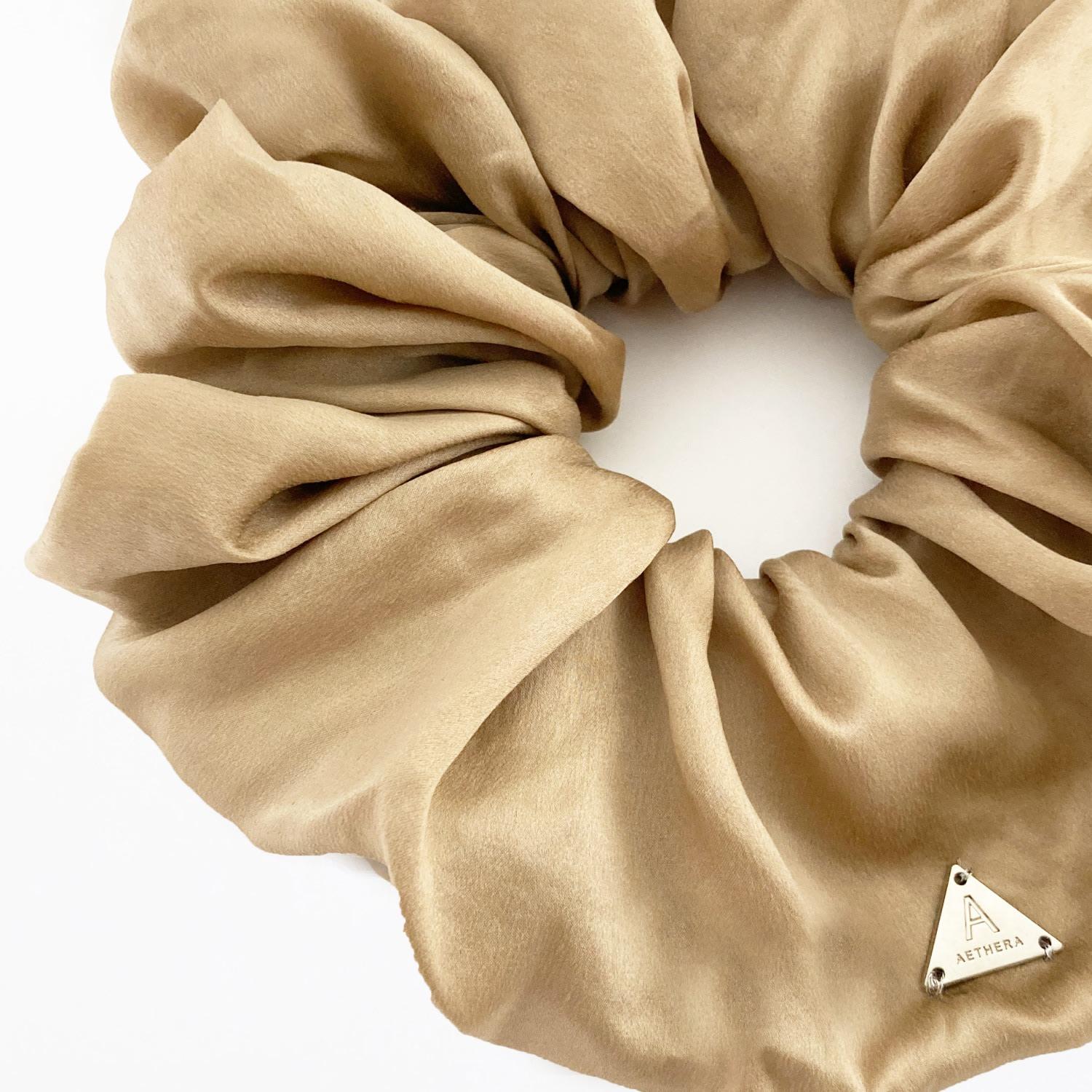 Aethera Luciana Bronze Oversized Silk Scrunchie in Natural | Lyst