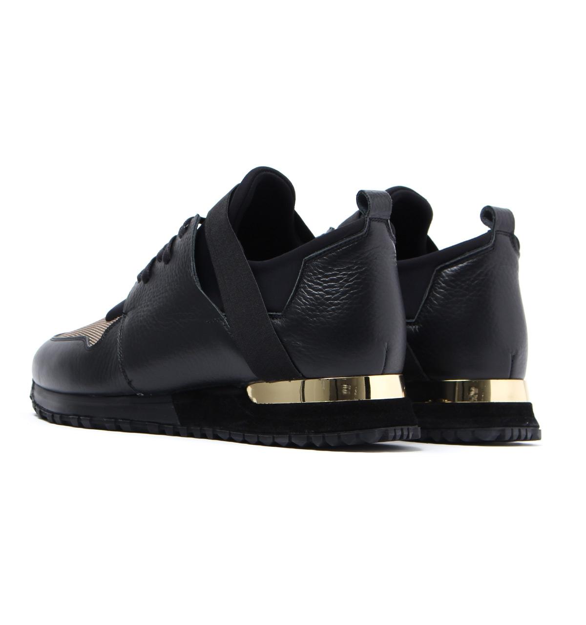 black and gold mallet trainers