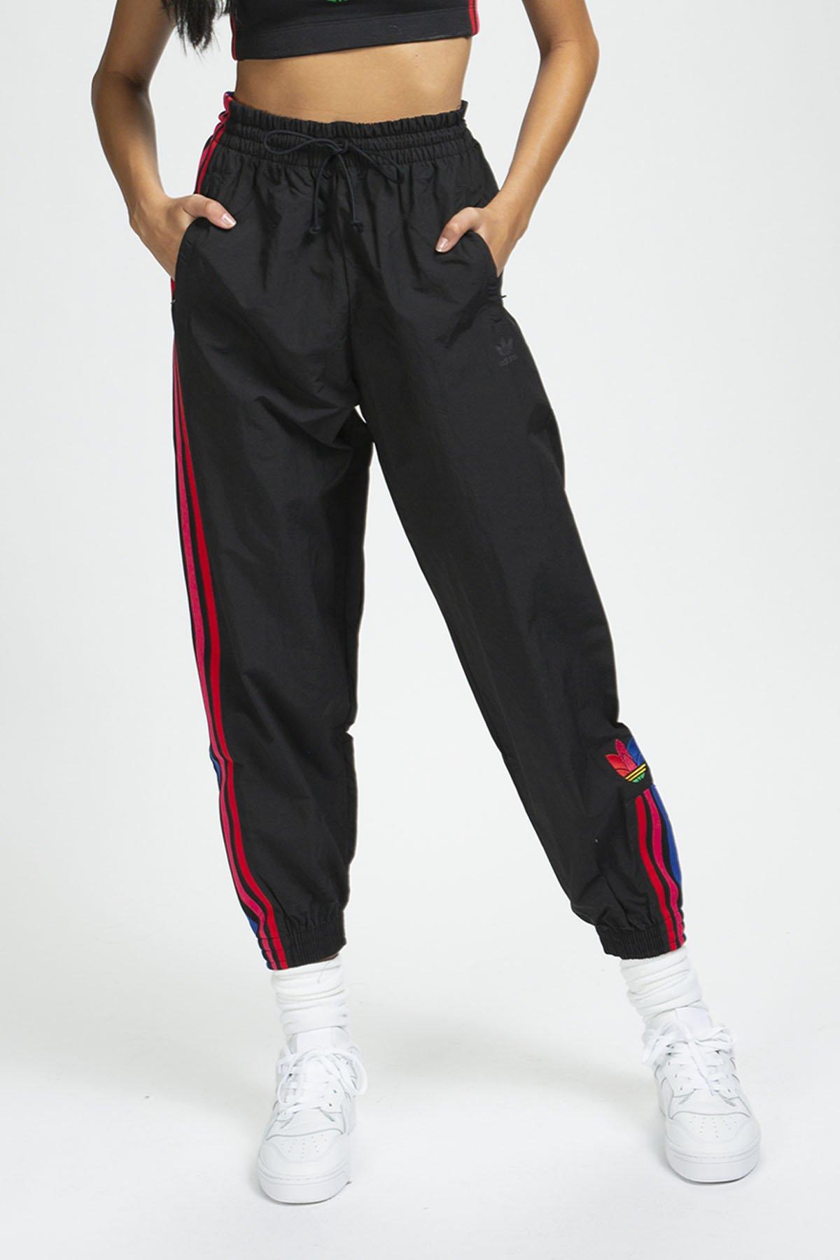 black adidas with rainbow stripes