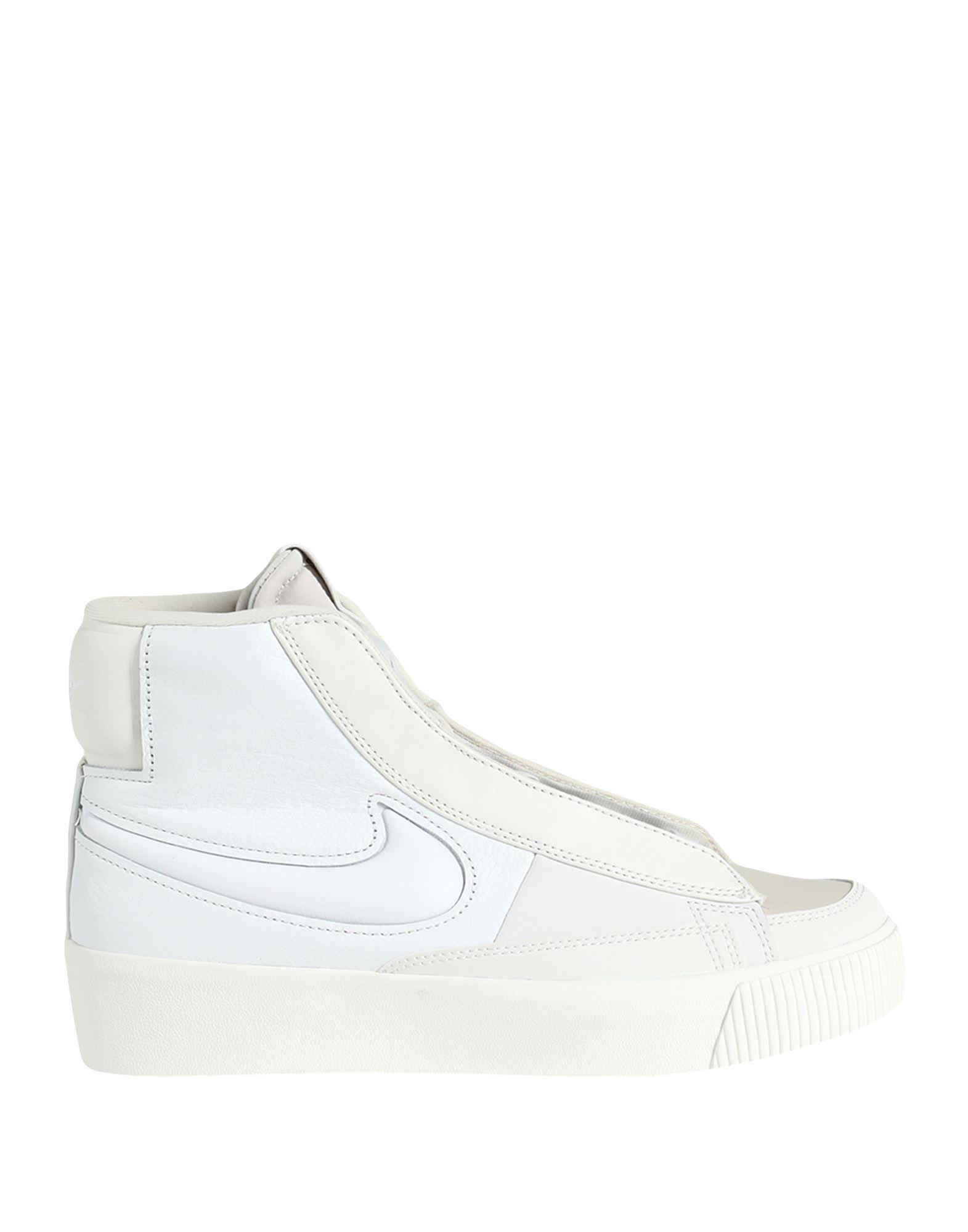 white plain nike shoes