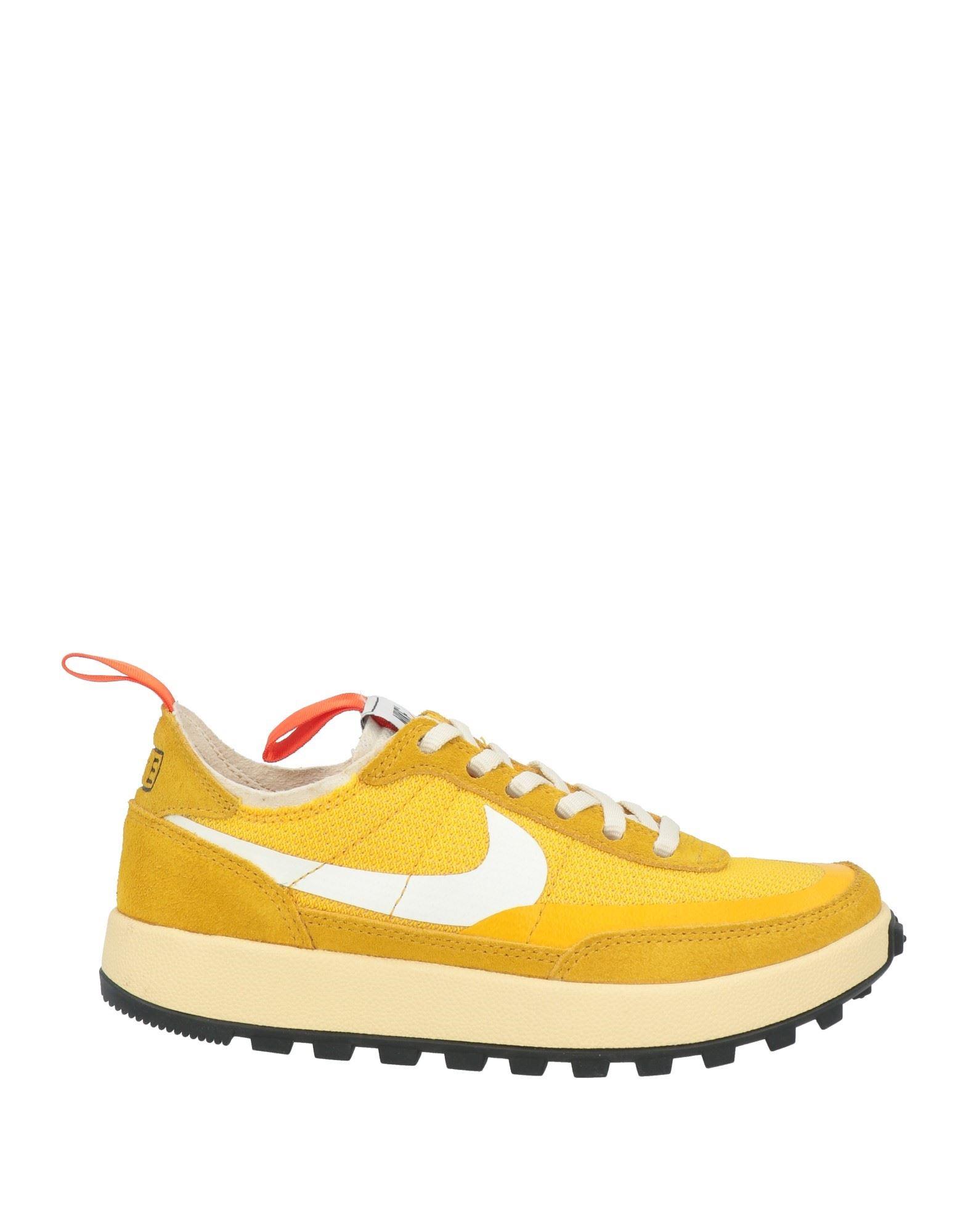 navy and yellow sneakers