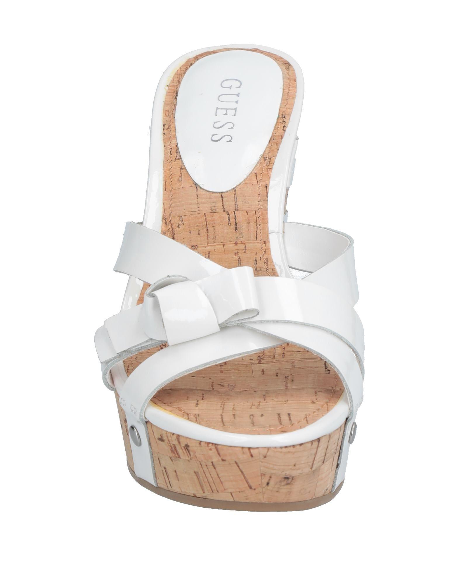 Mules \u0026 Zuecos Guess de color Blanco | Lyst