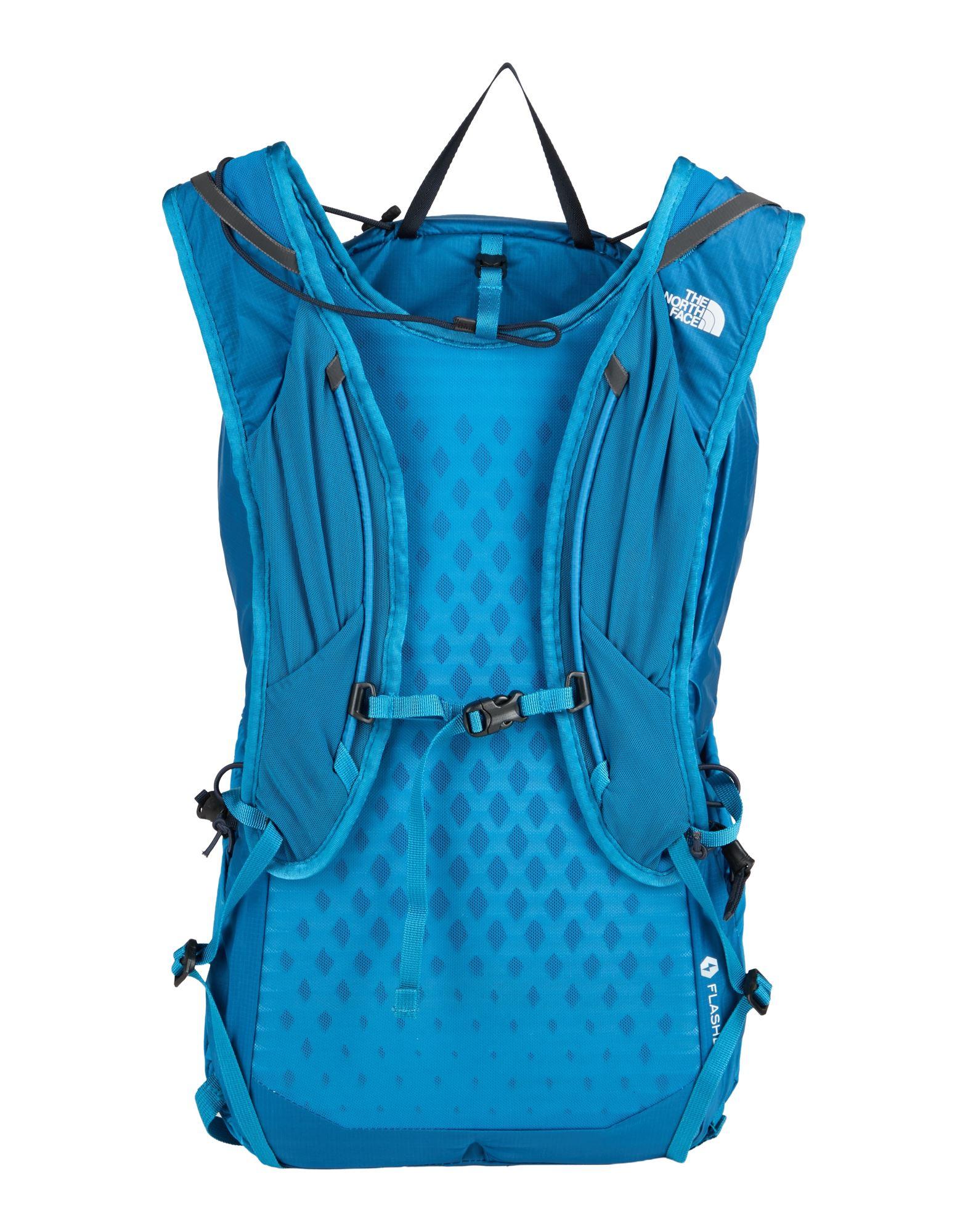 deep teal blue north face backpack The Borealis - 28L Two grab handles on top make it convenient to open and provide a balanced carry so it doesnt swing into your side when youre walking The North Face Blue Borealis
