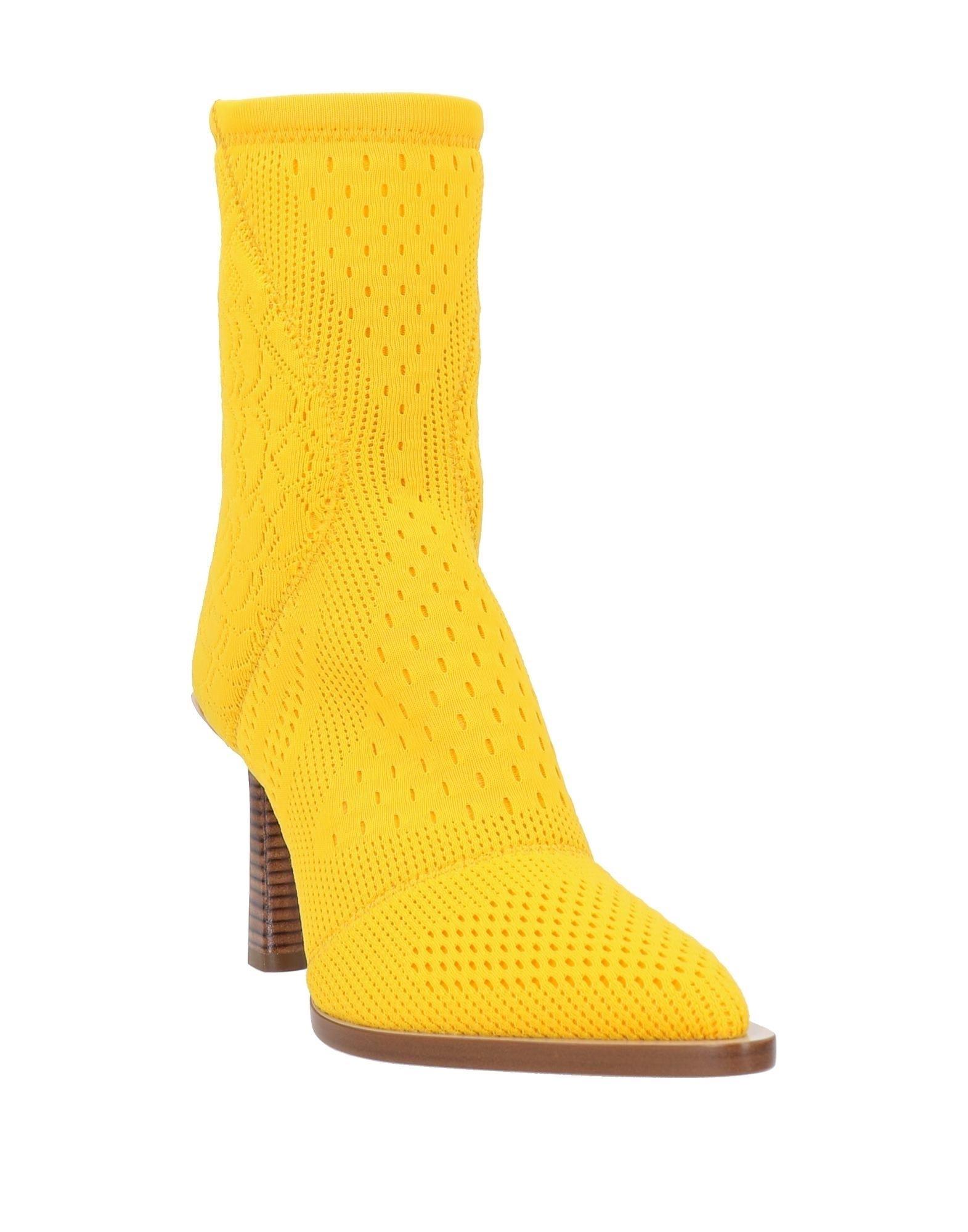Fendi Ankle Boots in Yellow | Lyst