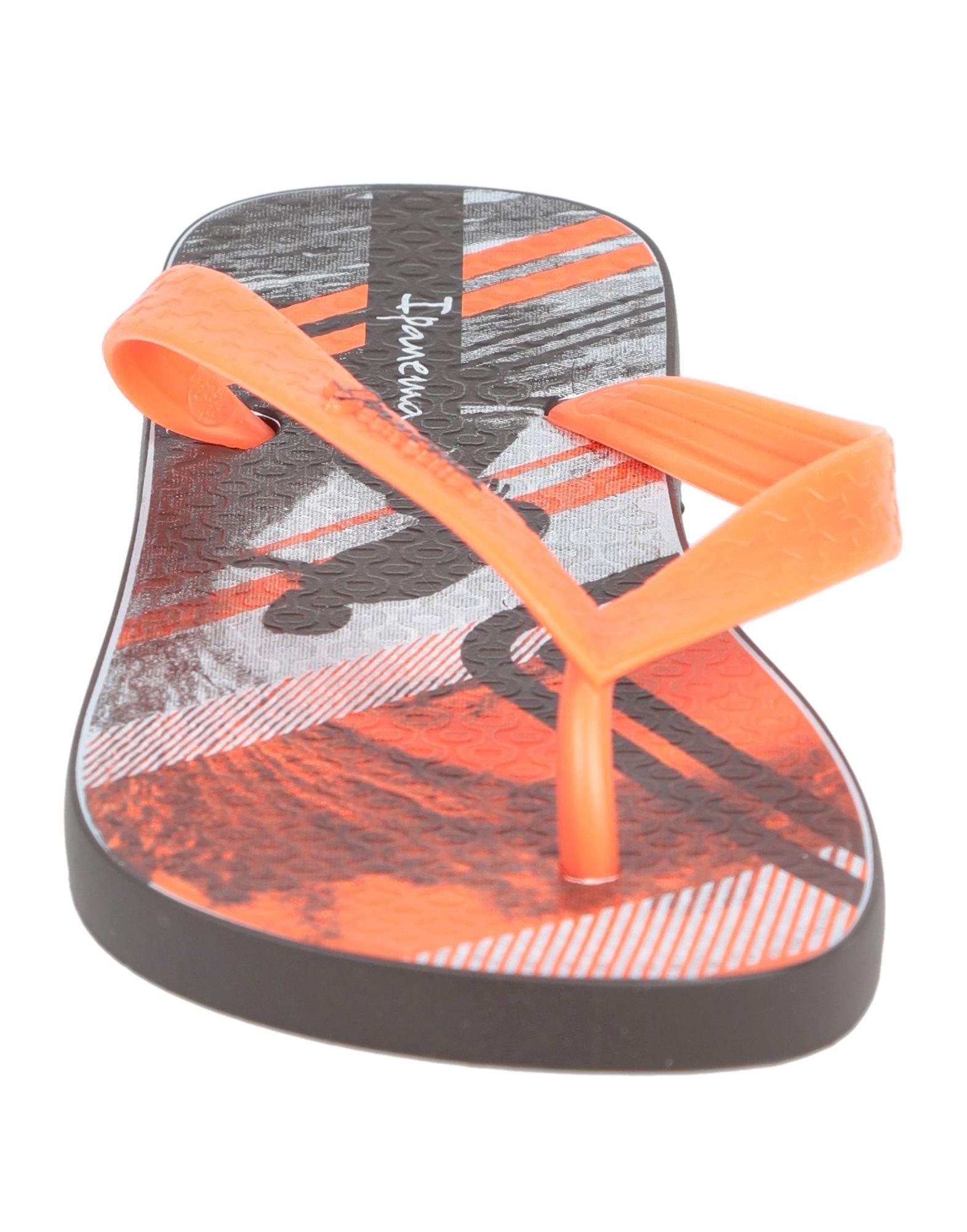 orange toe post sandals