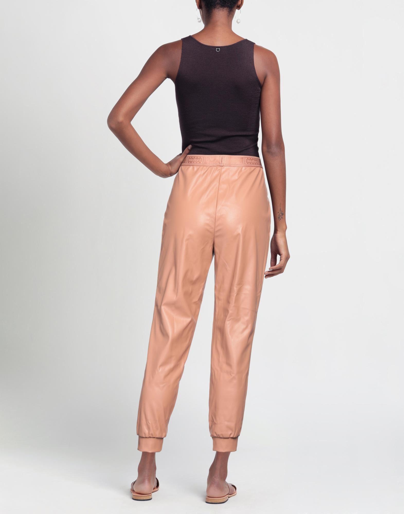 Wolford Pants in Natural | Lyst