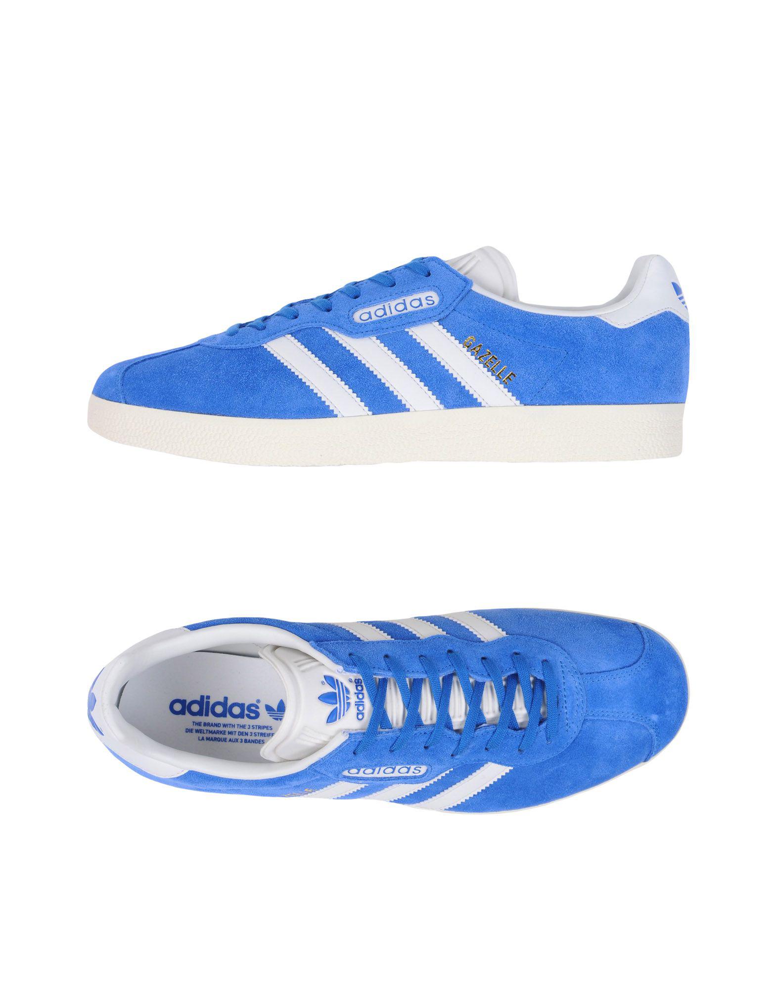 bright blue adidas gazelles