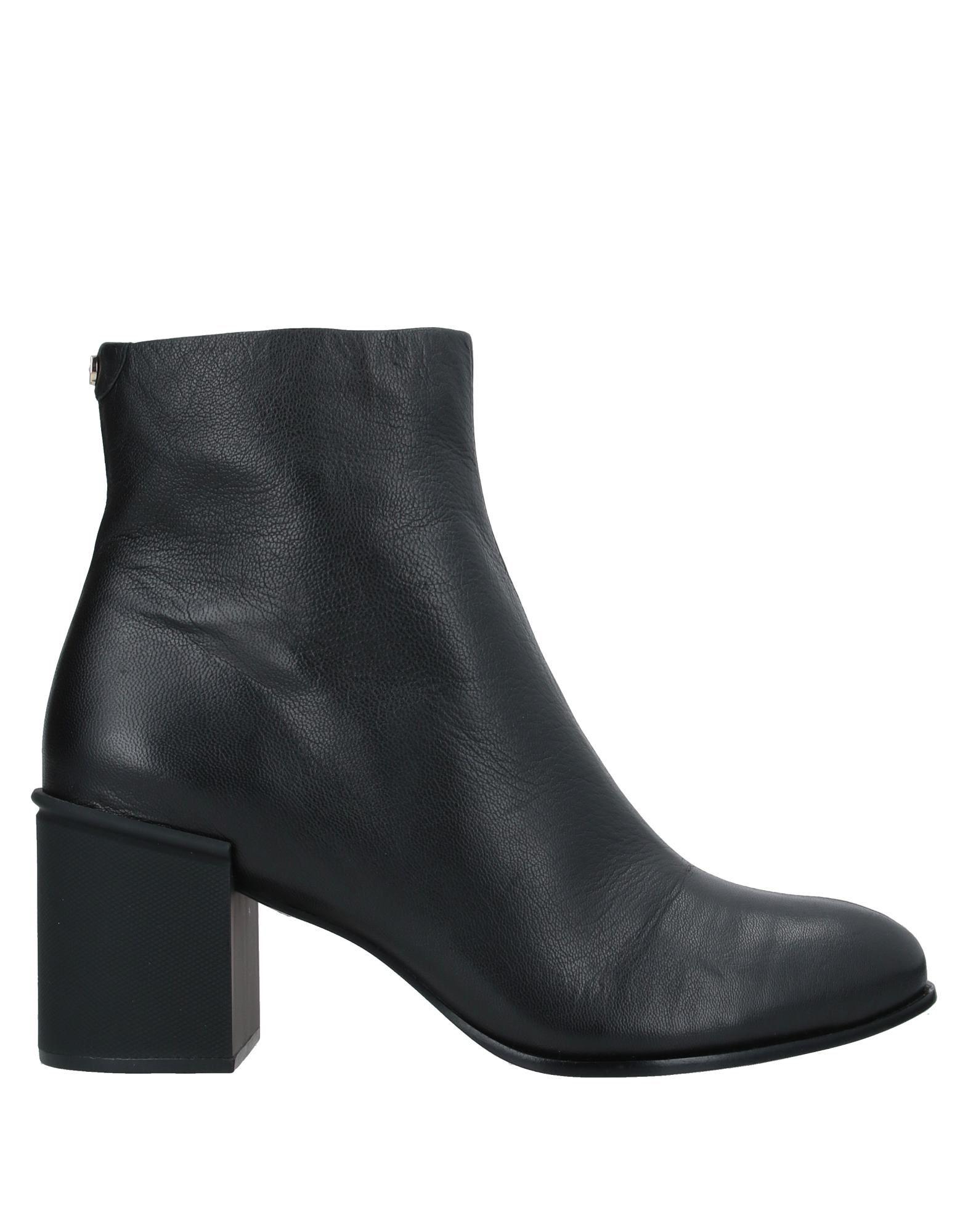 DKNY Leather Ankle Boots in Black - Lyst