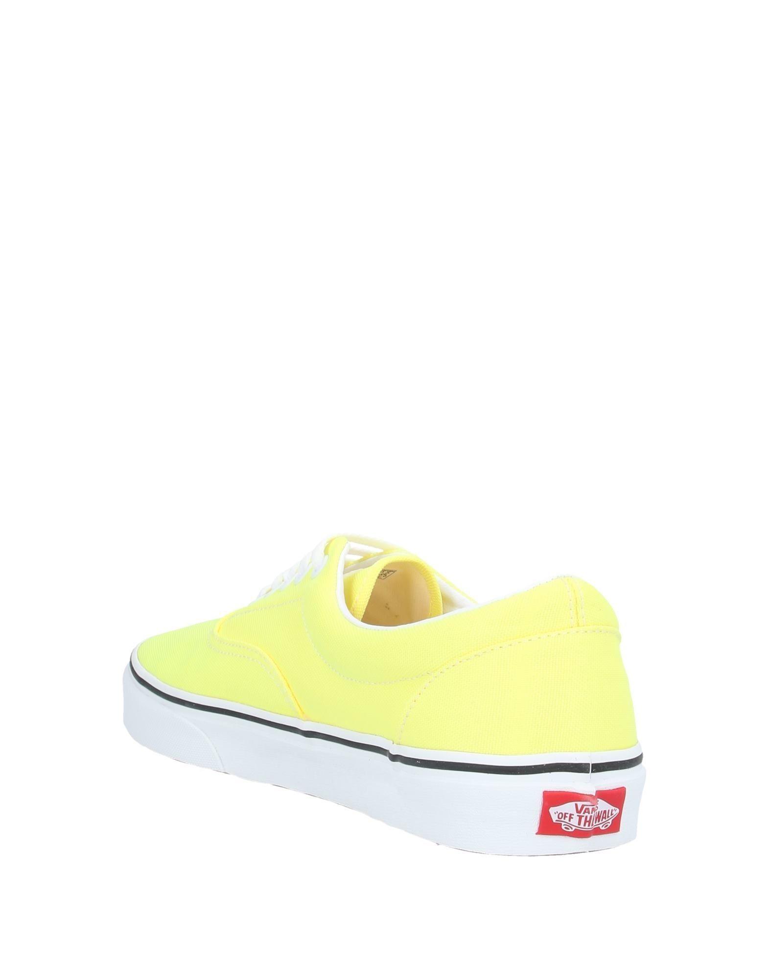 solid yellow vans slip on