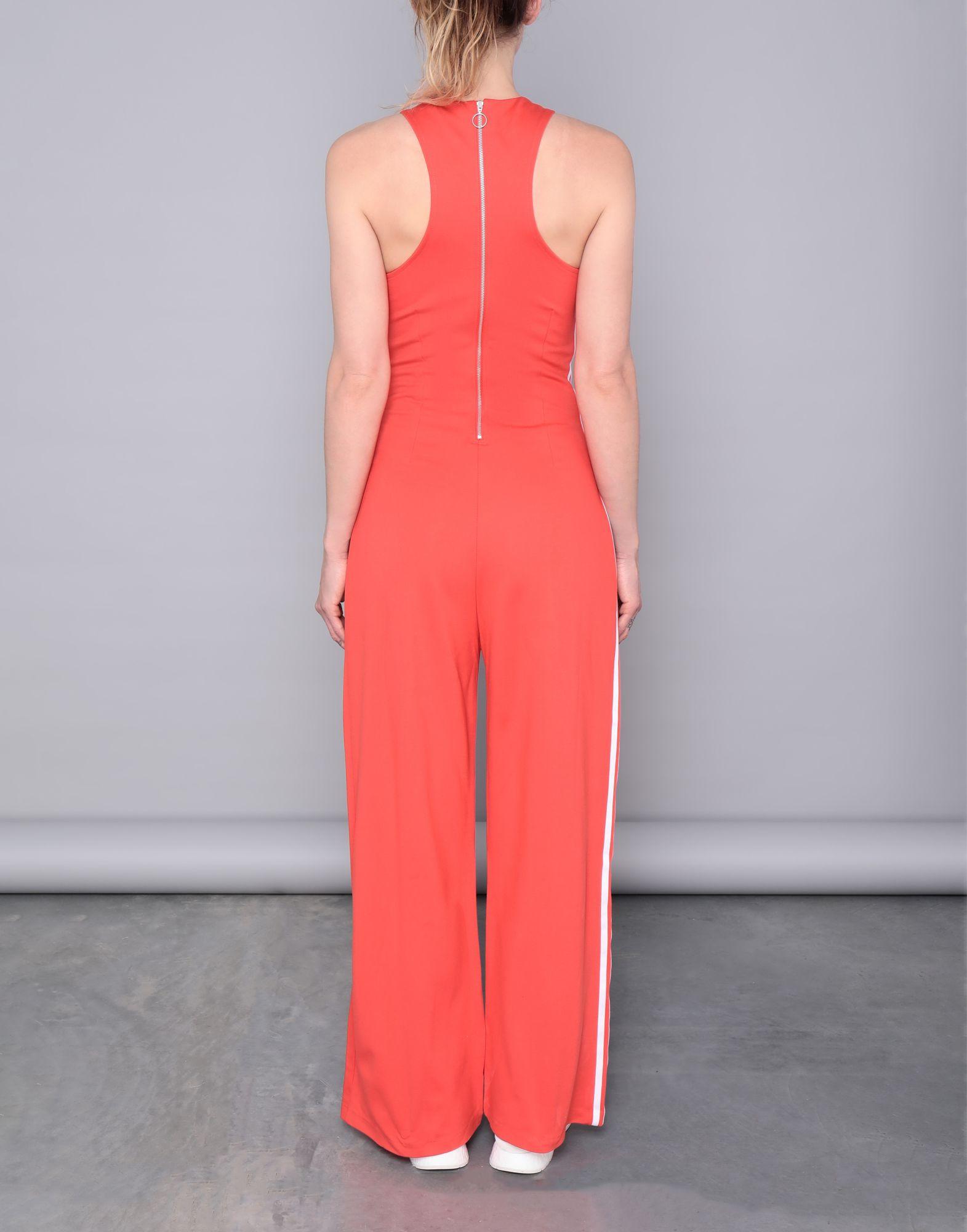 orange adidas jumpsuit