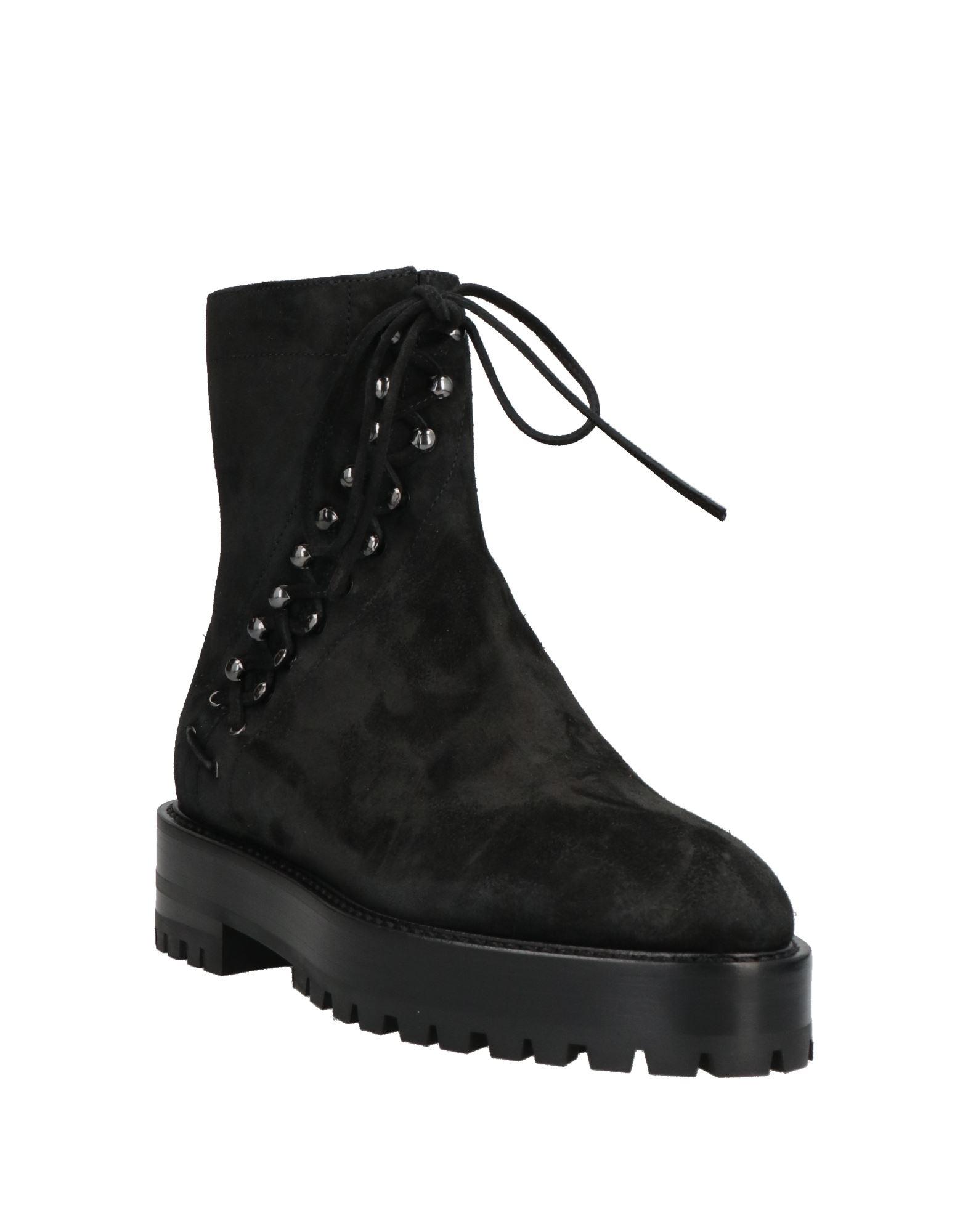 Alaïa Ankle Boots in Black | Lyst