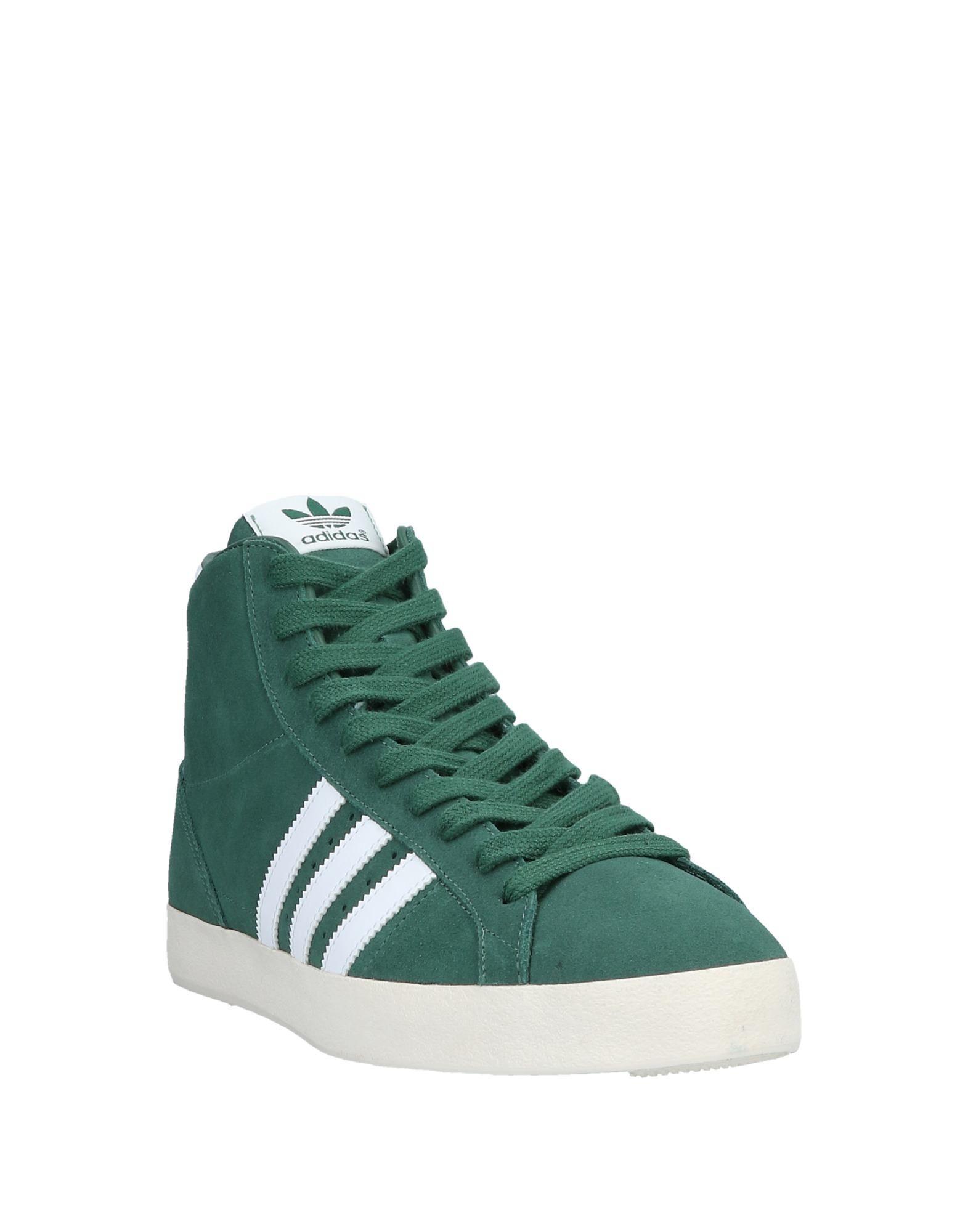 green and white adidas high tops