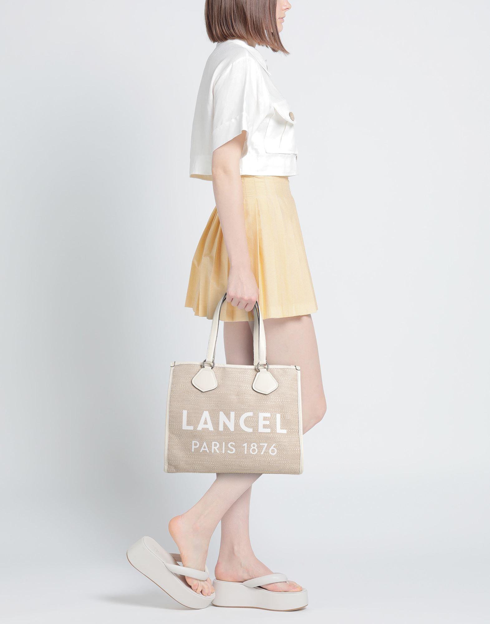 Lancel Handbag in Natural | Lyst