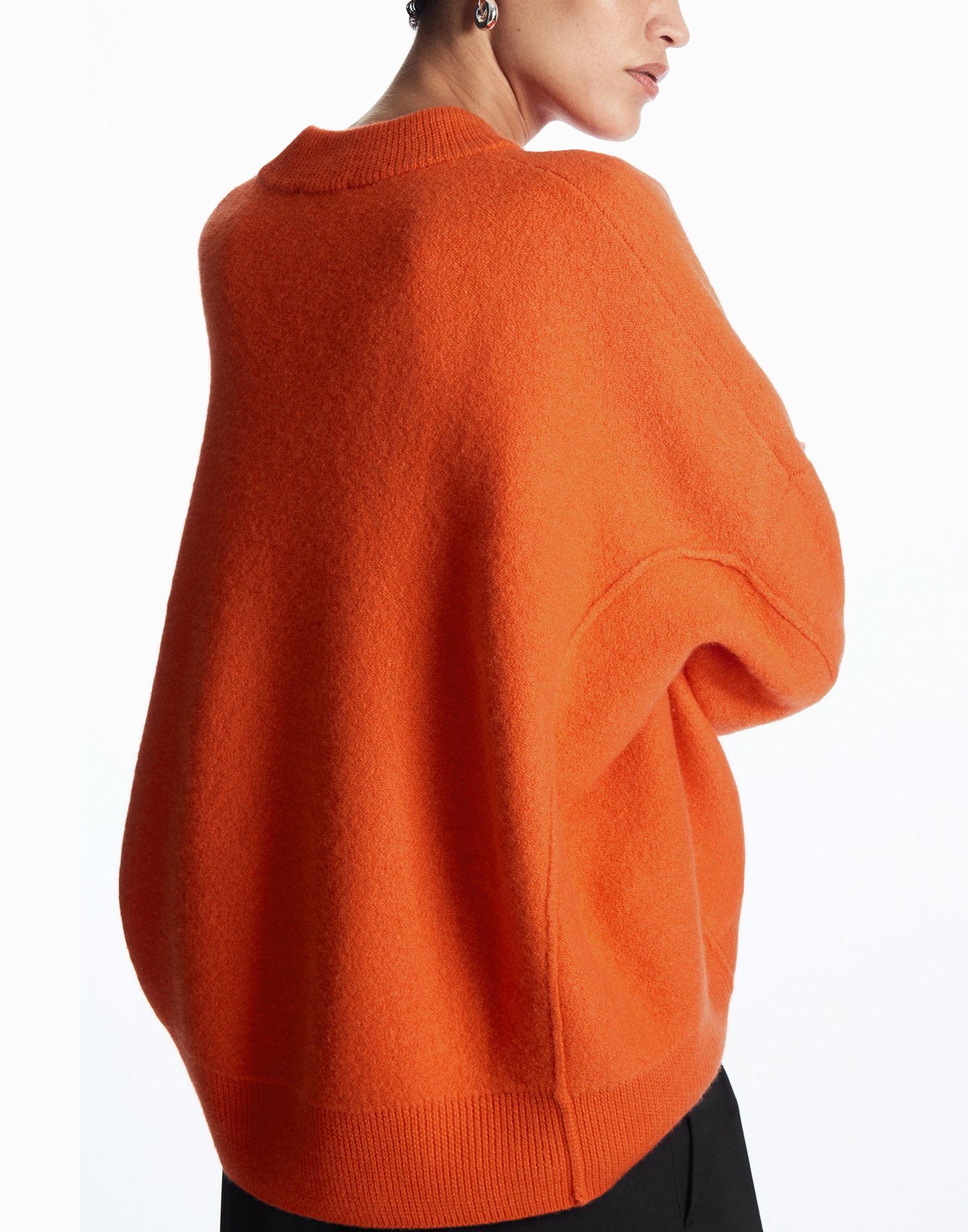 COS Dropped shoulder Boiled wool Sweater in Orange Lyst UK