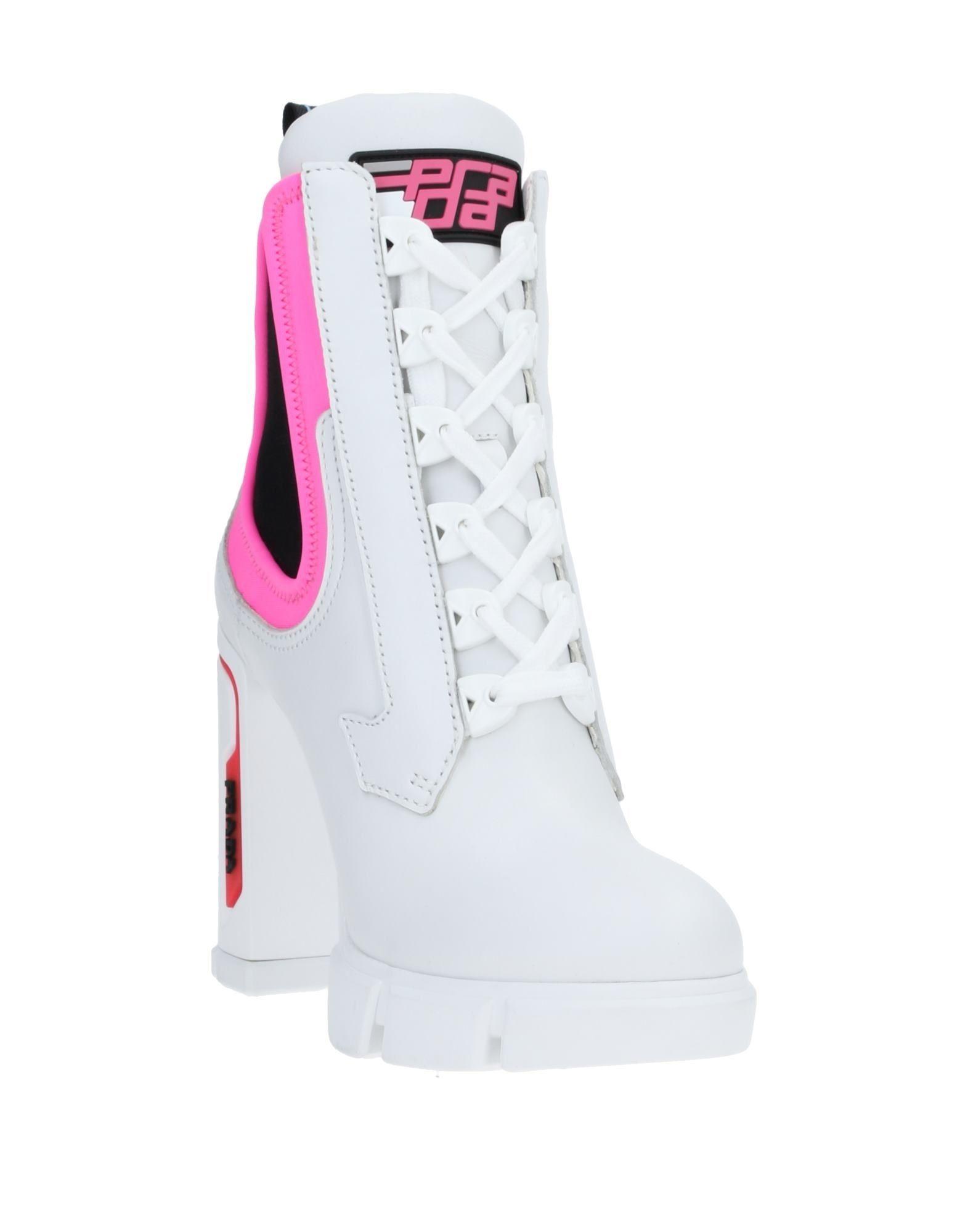 pink and white prada boots