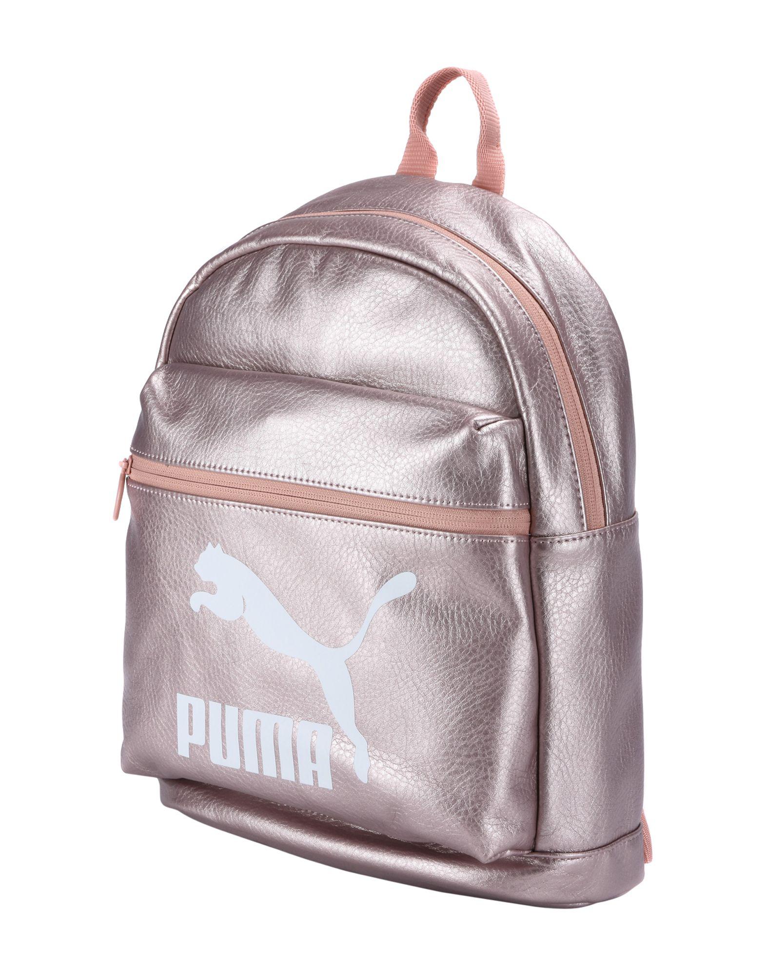 pink and black puma backpack