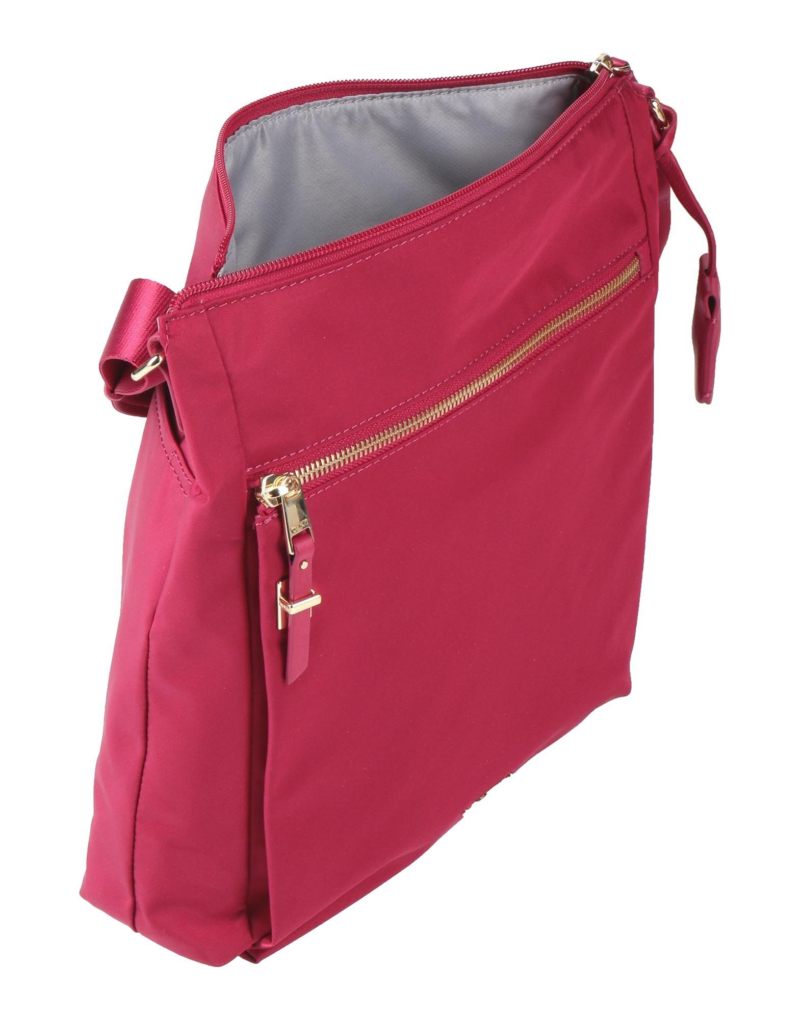 Tumi Cross-body Bag in Pink | Lyst