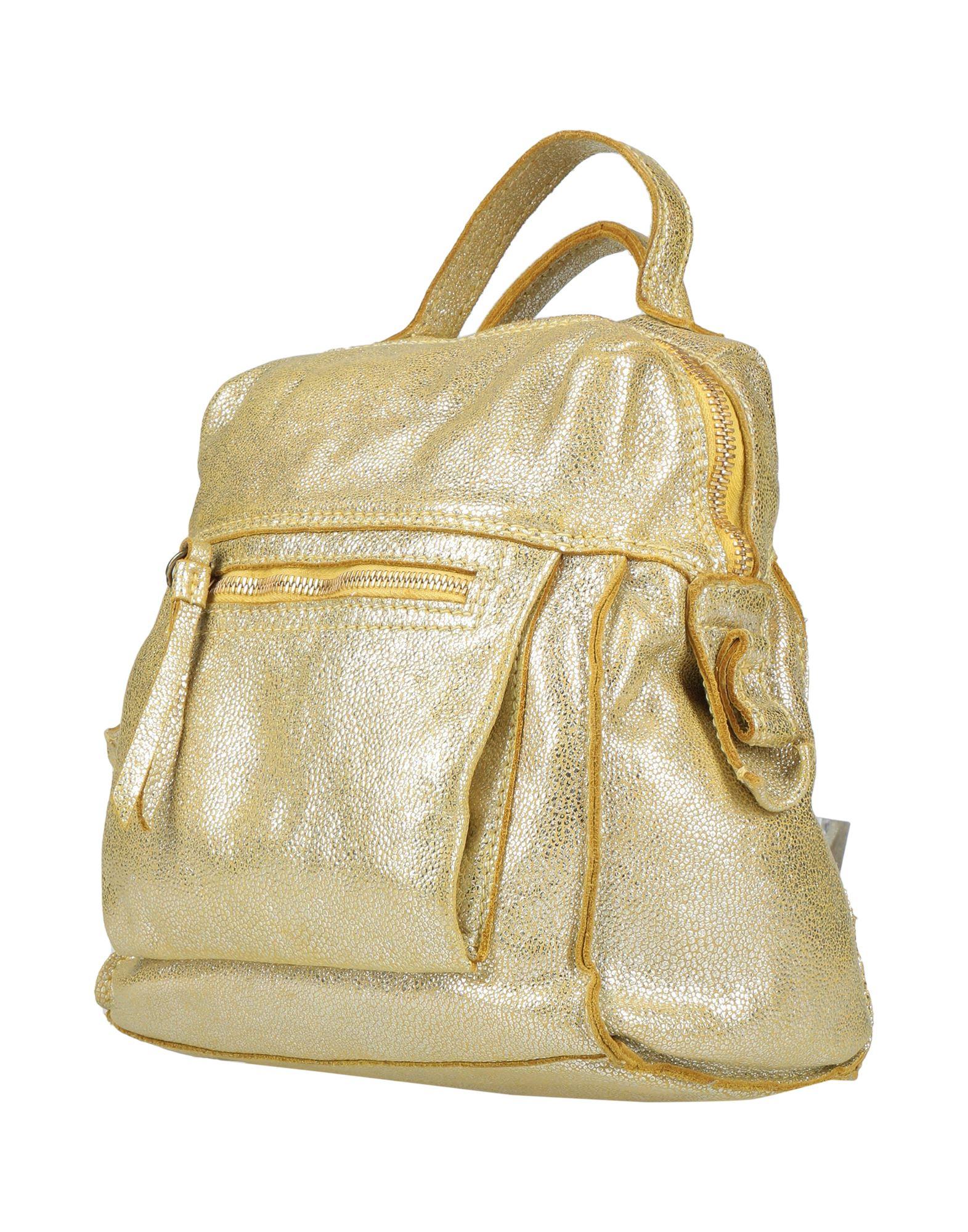 Caterina Lucchi Backpack in Yellow | Lyst