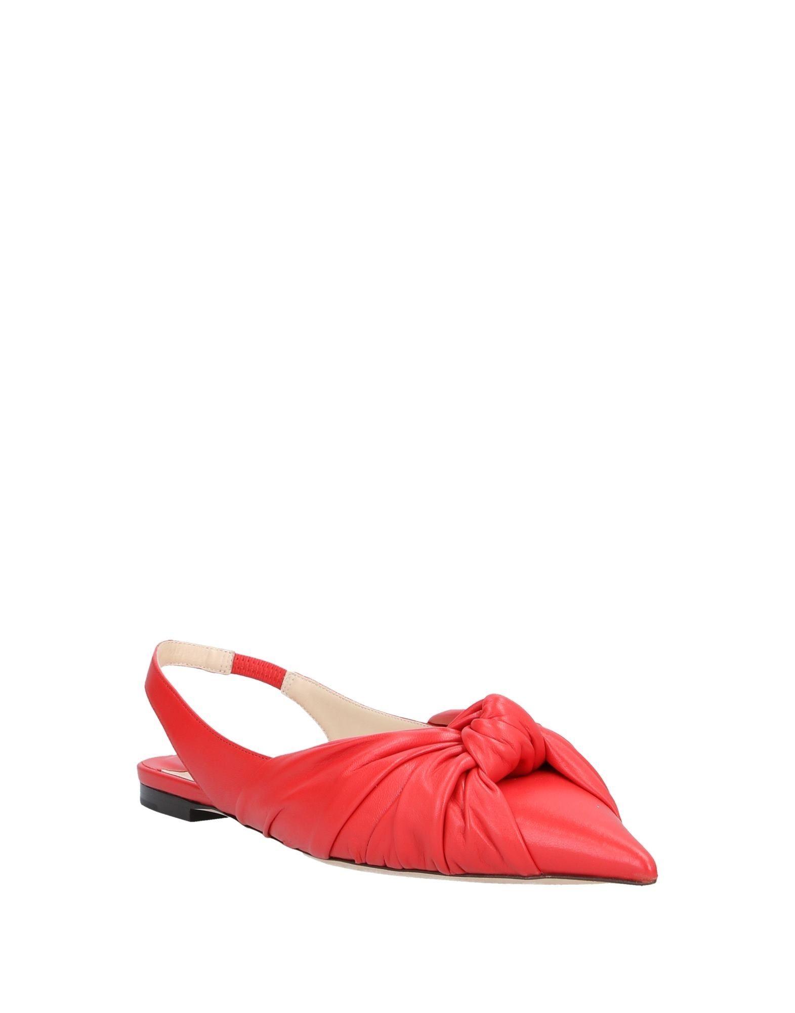 red jimmy choo flats