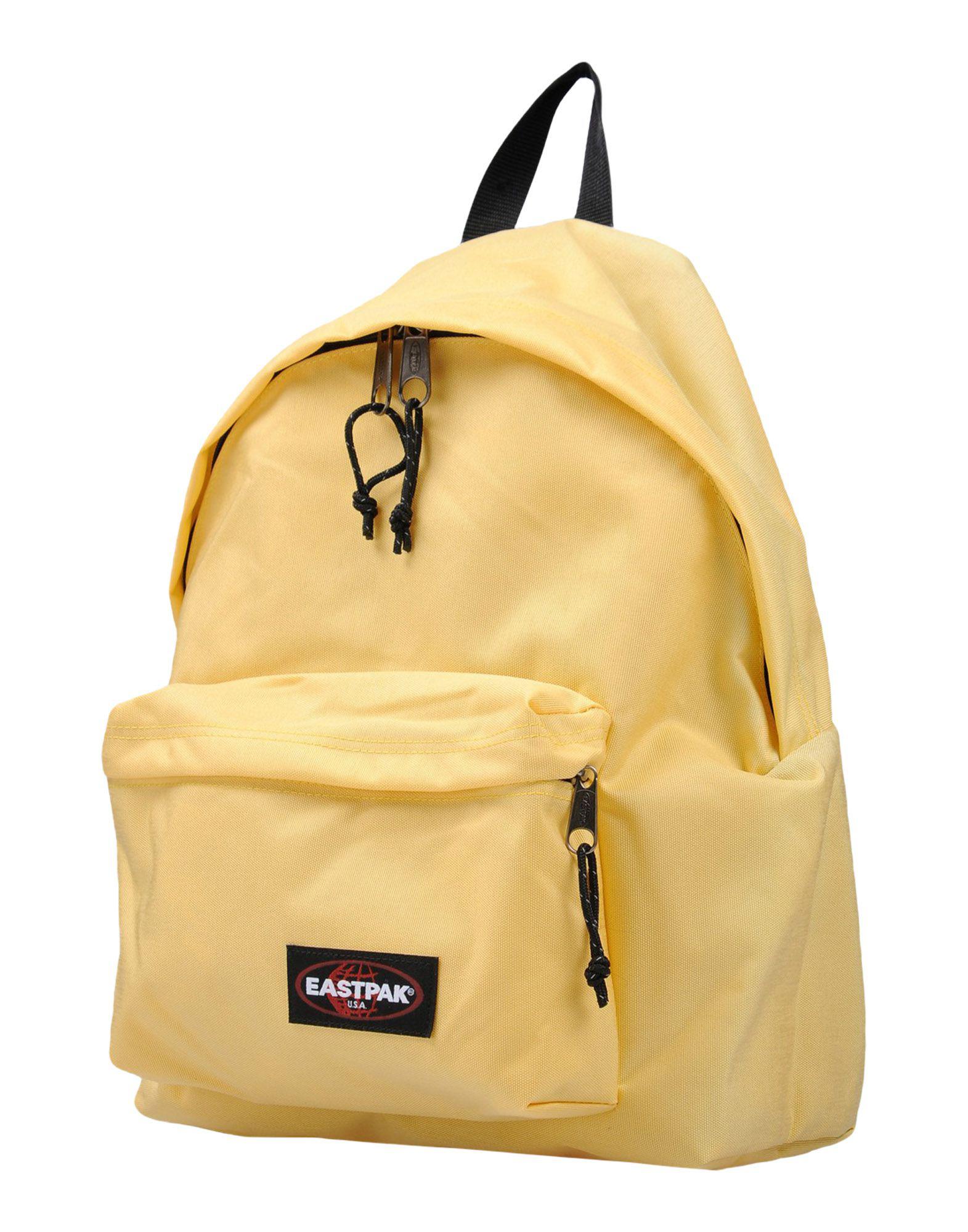 eastpak yellow backpack