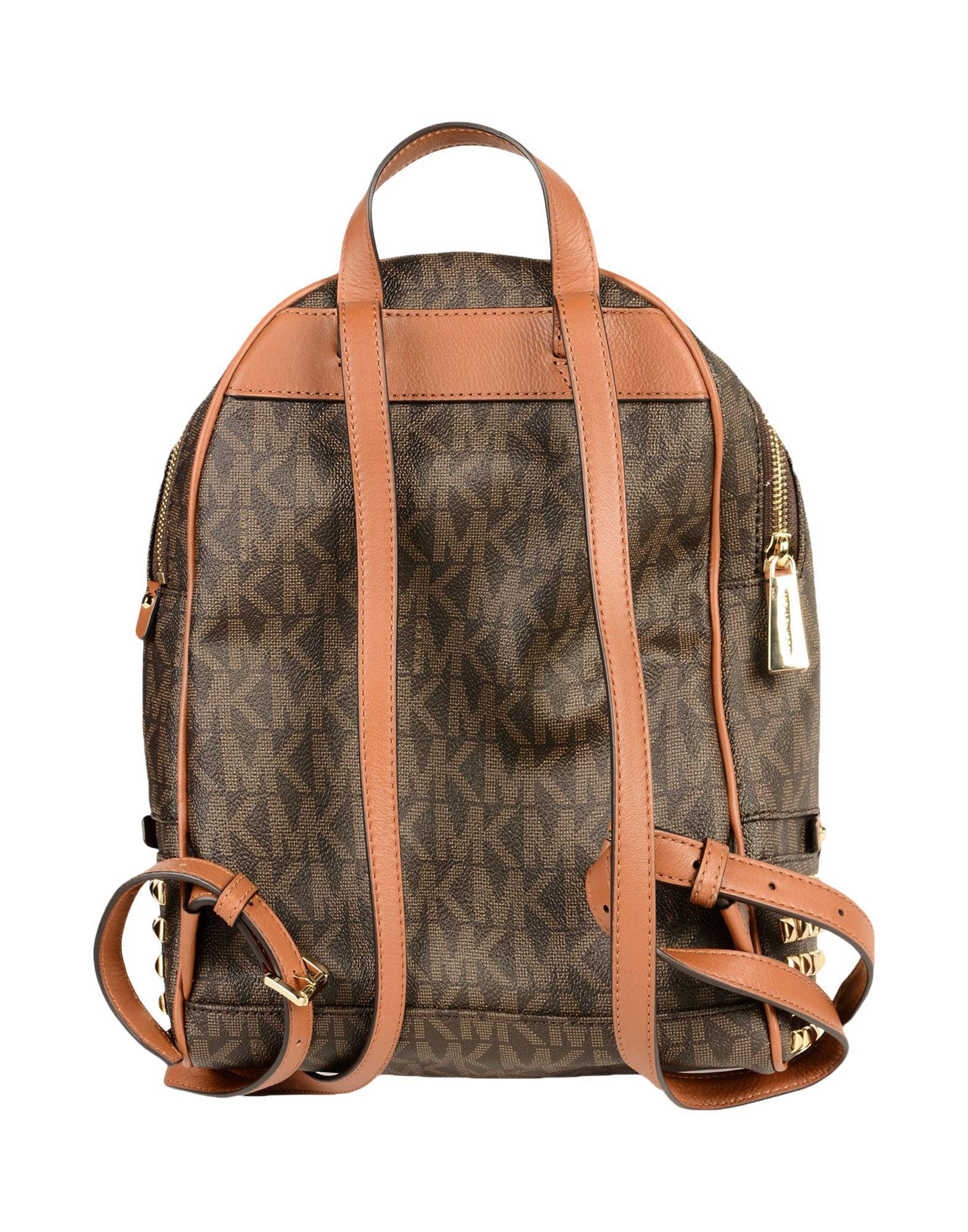 Lyst Michael Michael Kors Large Studded LogoPrint Backpack in Brown