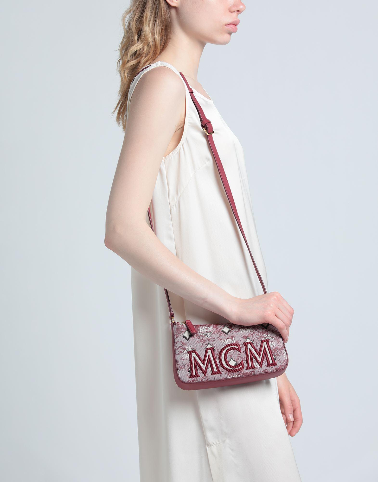 pink mcm crossbody bag