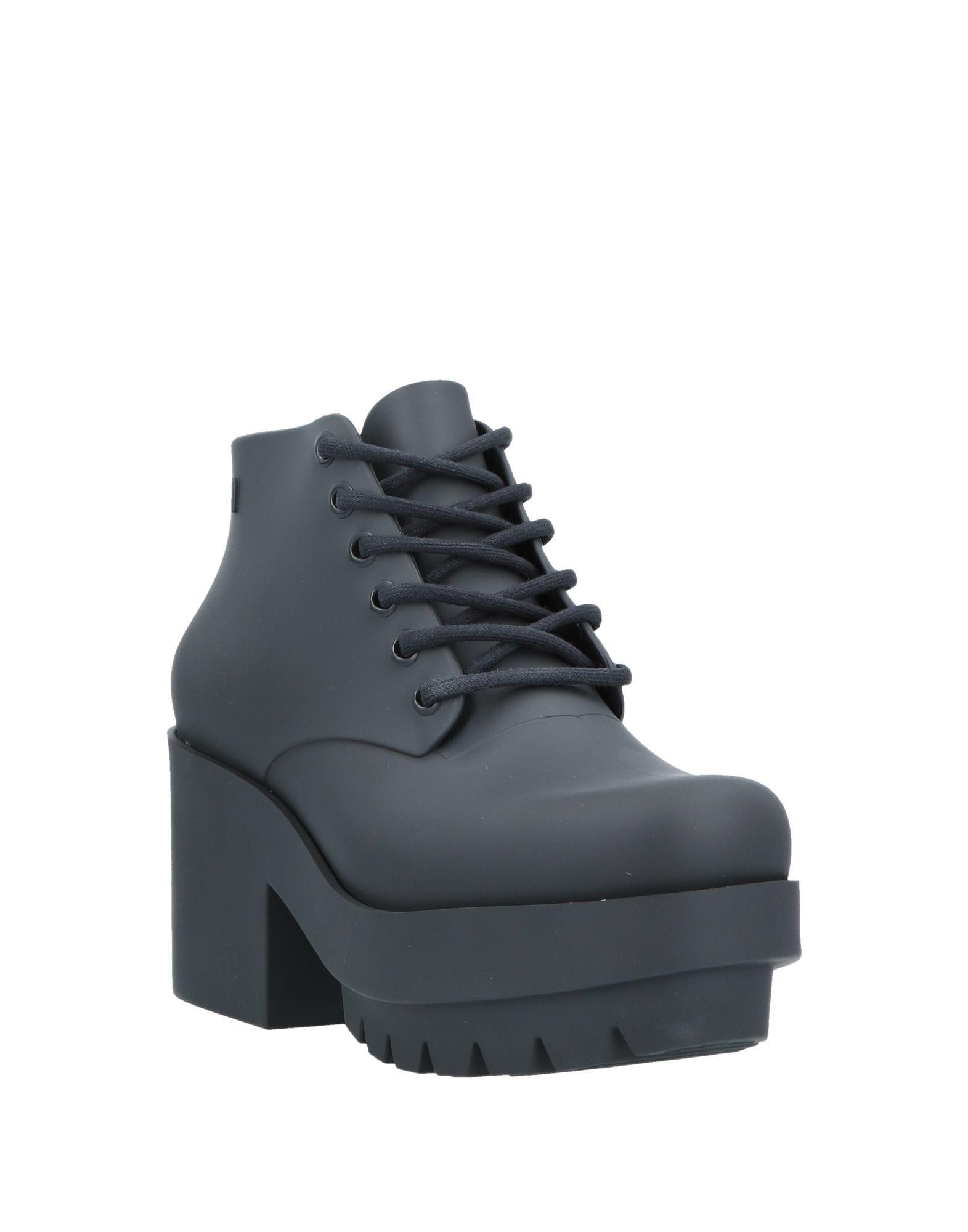 Melissa Rubber Ankle Boots in Black Lyst