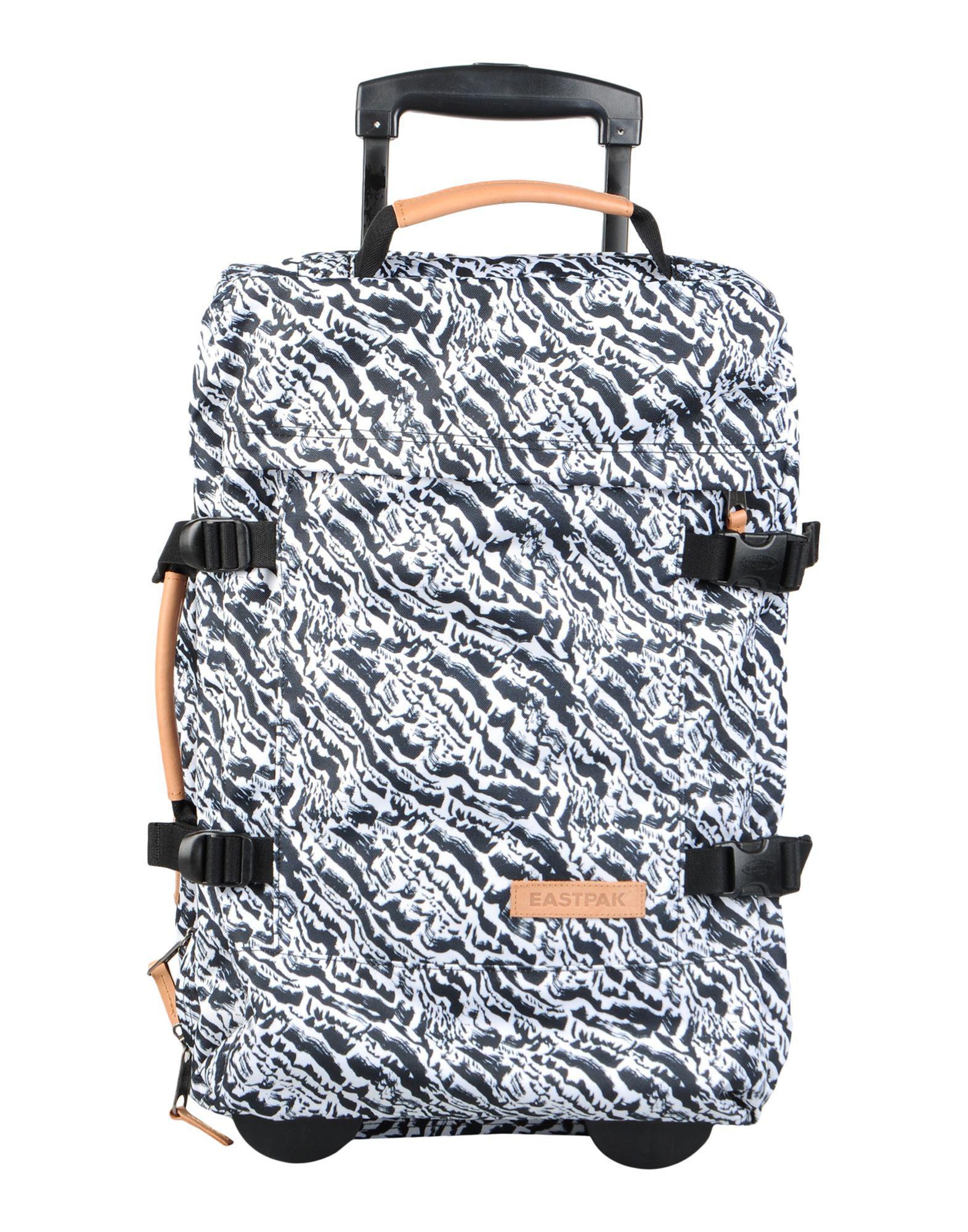Eastpak Wheeled Luggage in Black Lyst