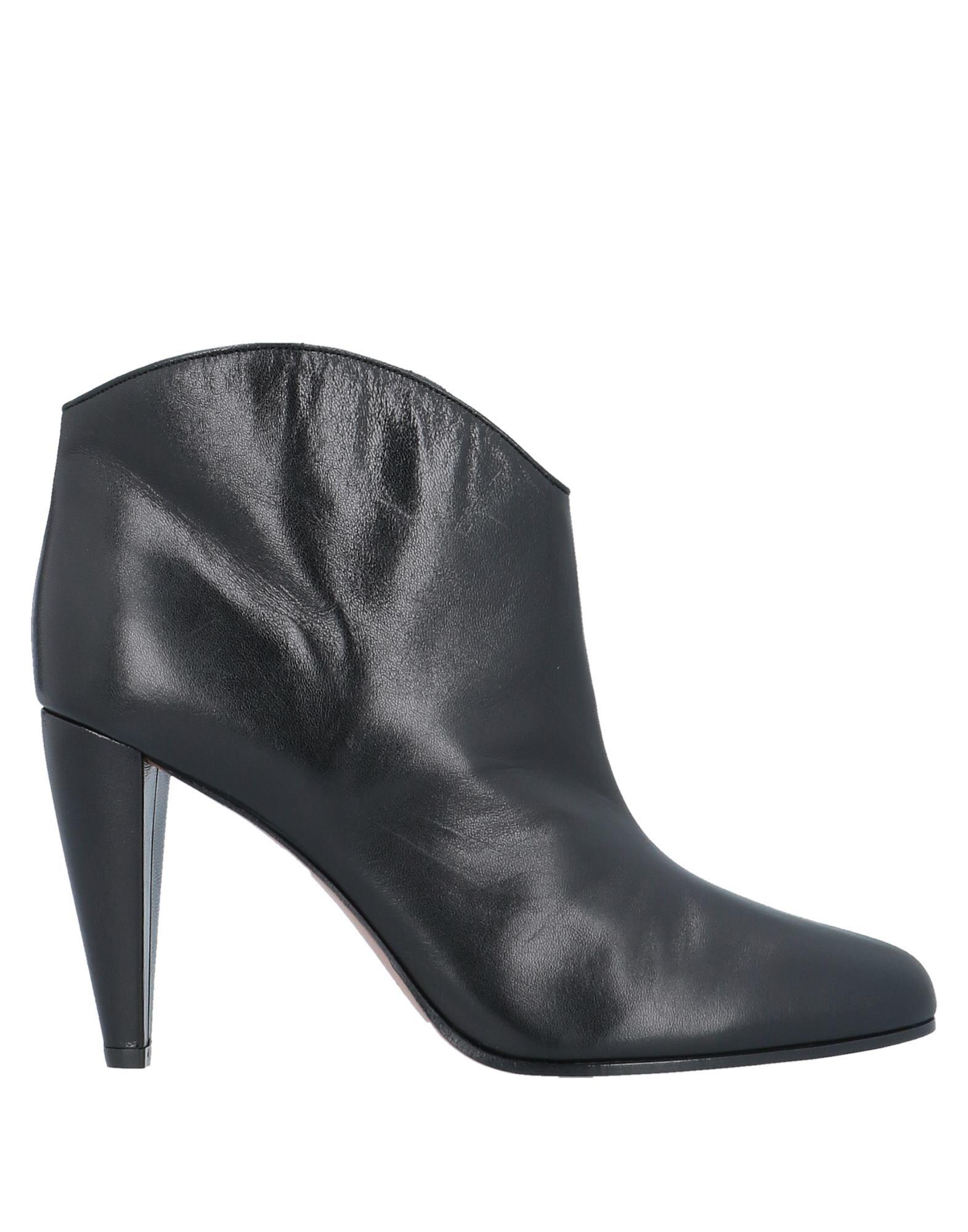 Celine Leather Ankle Boots in Black - Lyst