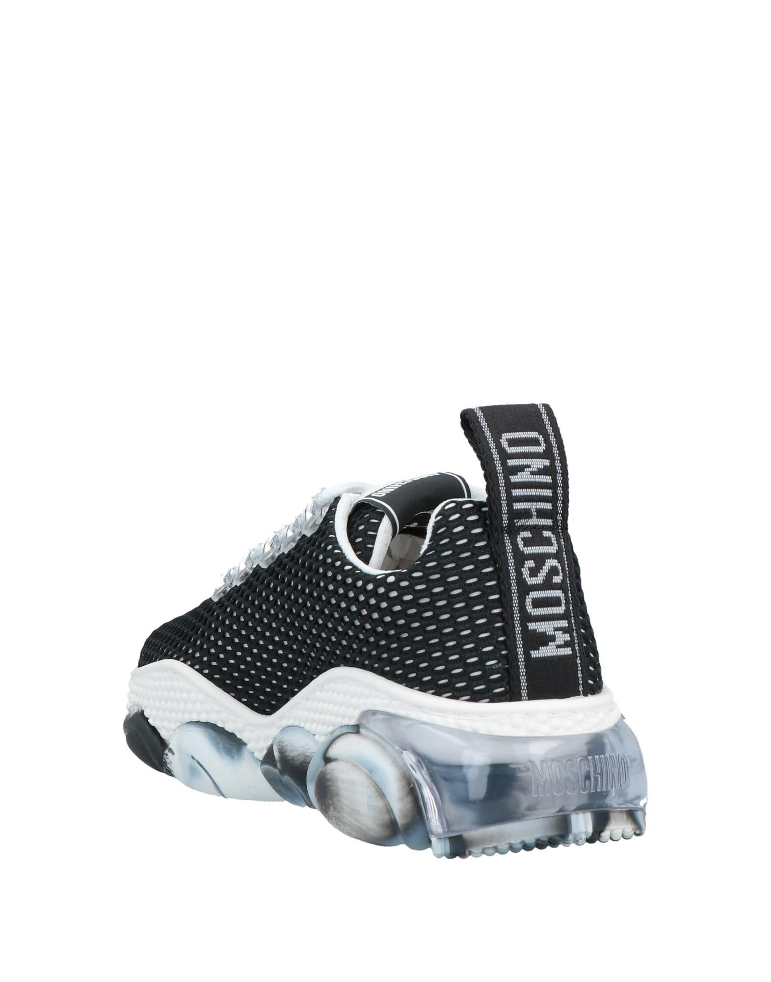 black moschino trainers