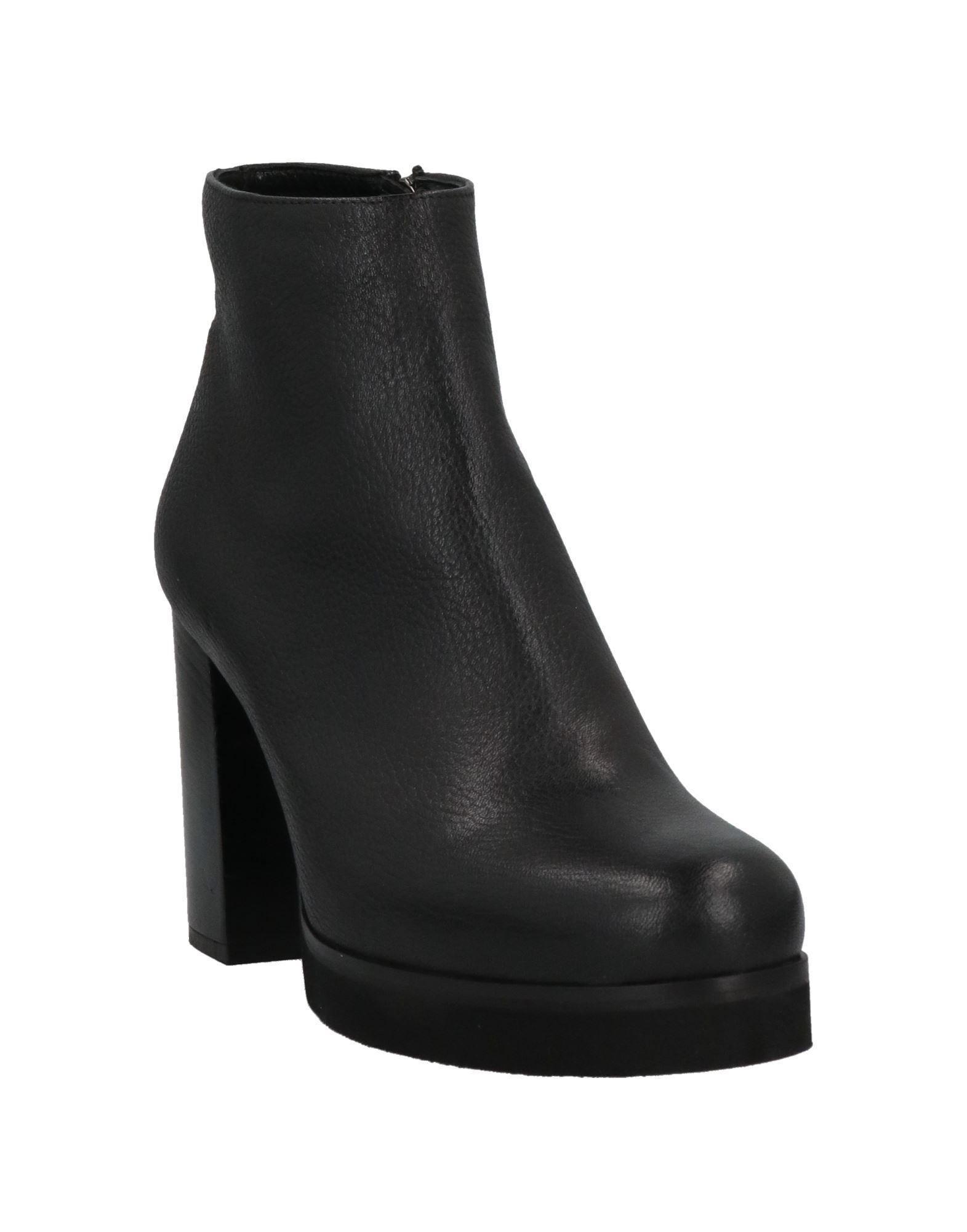 The Seller Ankle Boots in Black | Lyst