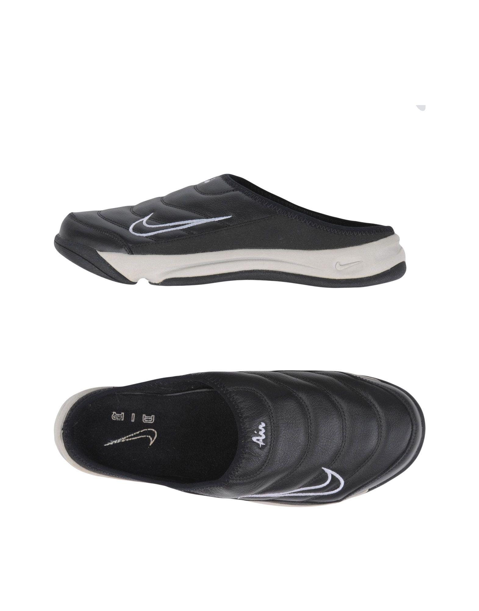 Buzo tienda Húmedo Mules & Zuecos Nike de hombre de color Negro | Lyst