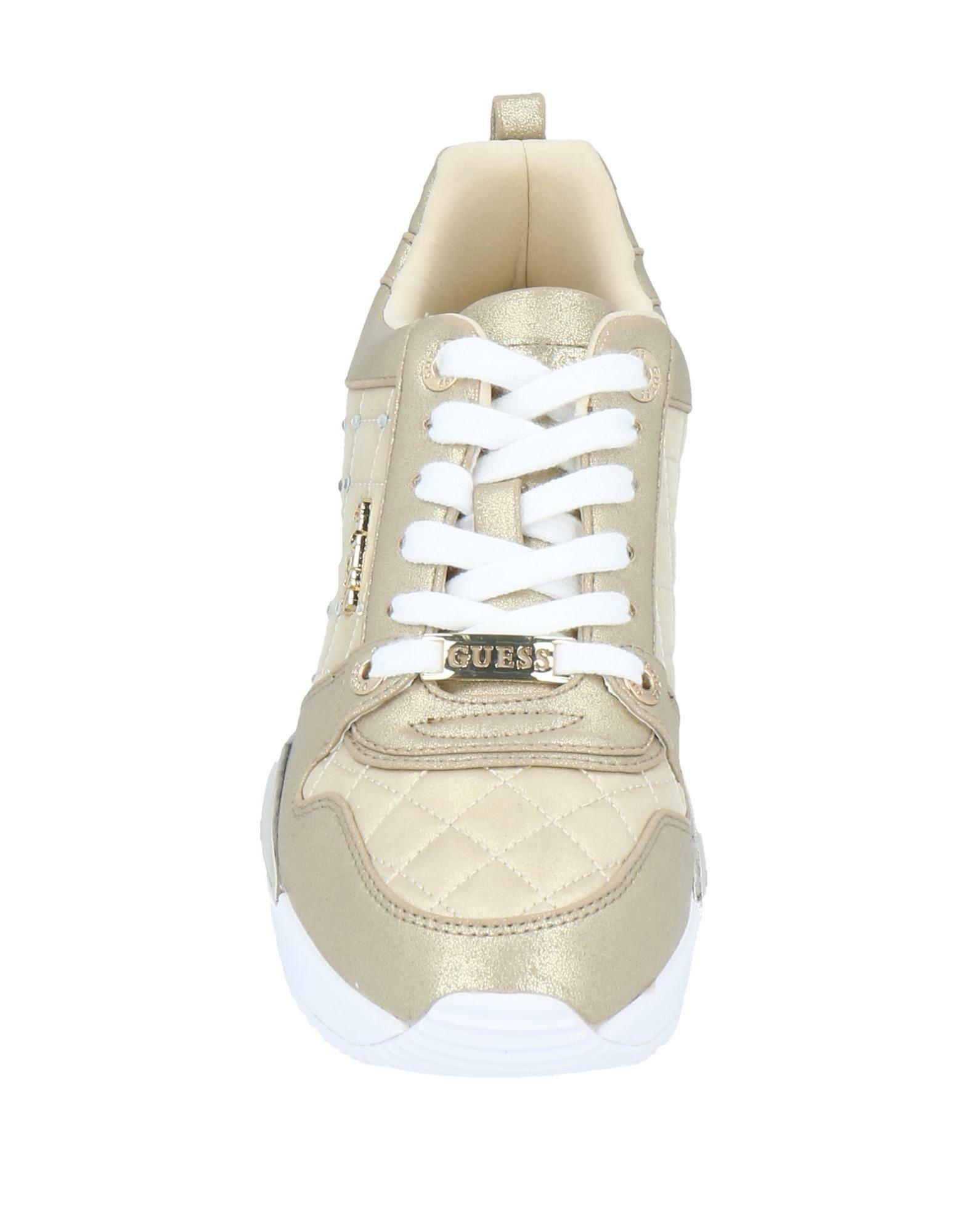 guess gold trainers