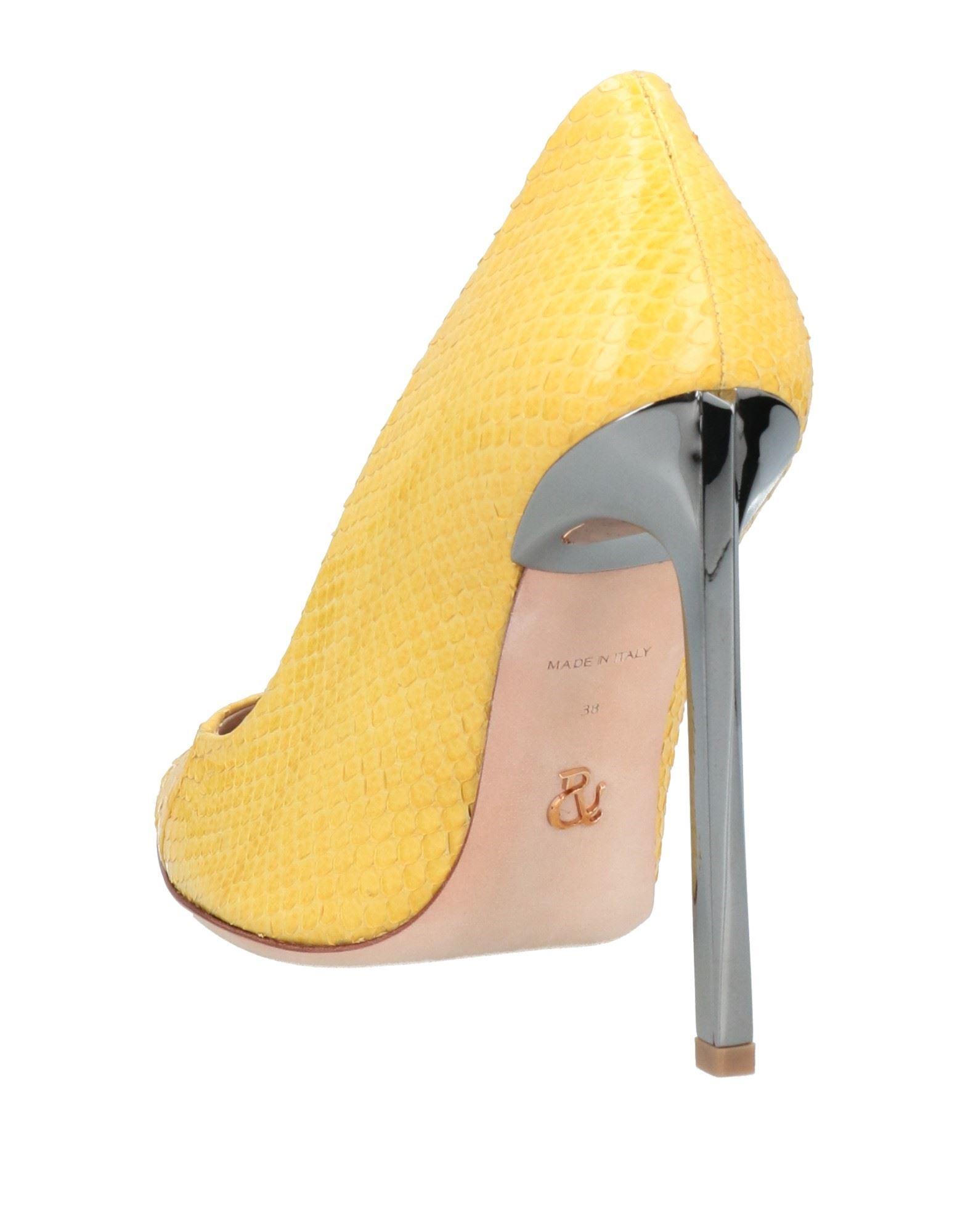 designer yellow pumps