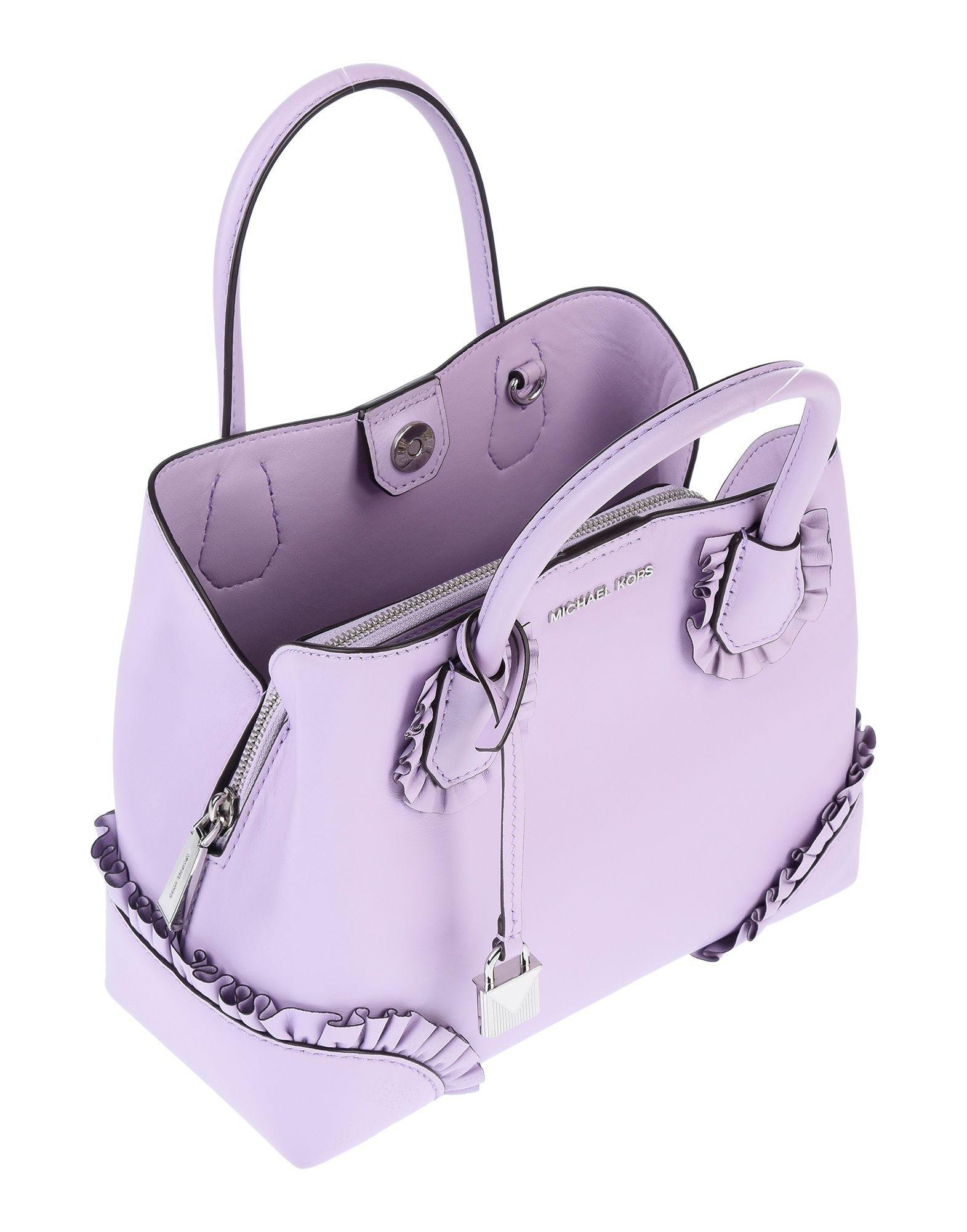 Michael Kors purple shoulder bags
