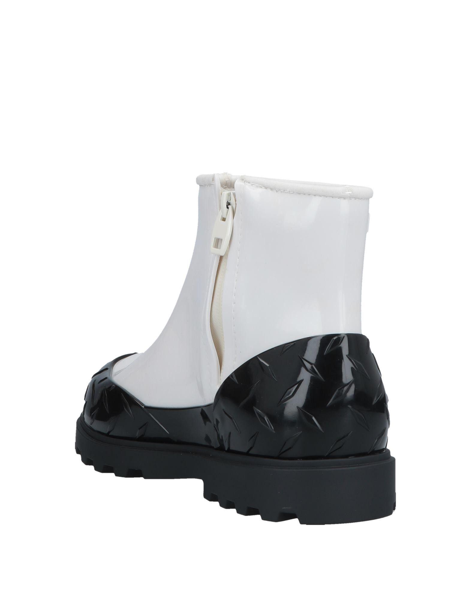 Melissa Rubber Ankle Boots in Black Lyst