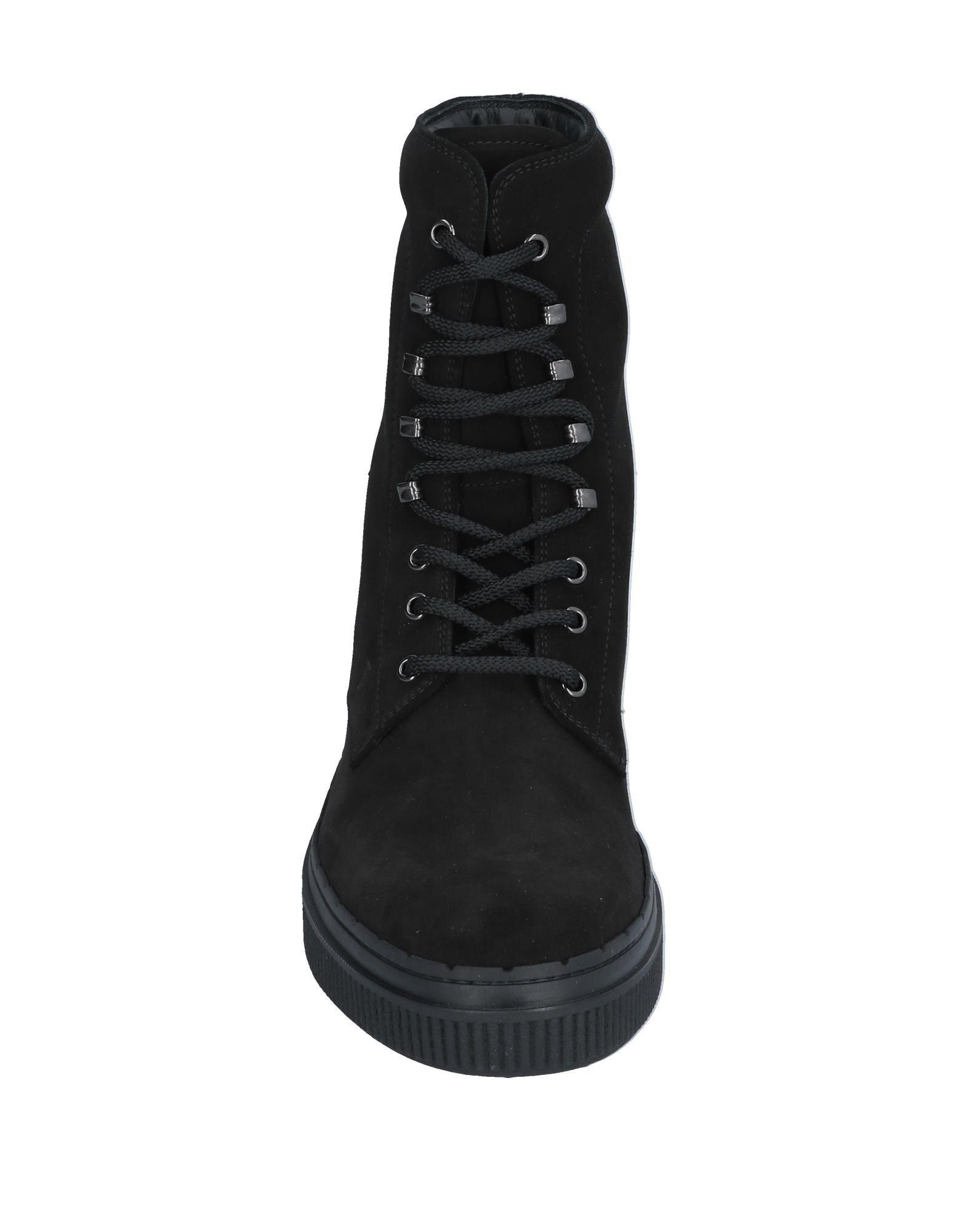 Tod's Ankle Boots in Black for Men - Lyst